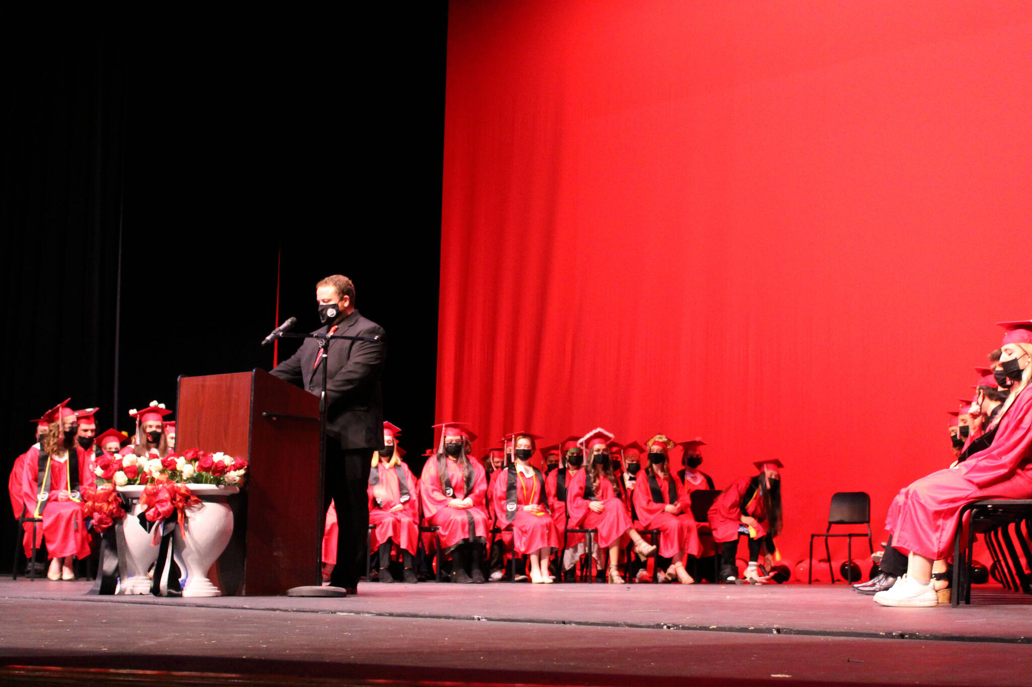 Kenai Central High School Assistant Principal Will Chervenak speaks during graduation on Monday, May 17, 2021 in Kenai, Alaska. Chervenak won the Alaska Region III assistant principal of the year honor on Monday, Nov. 8, 2021, the Kenai Peninsula Borough School District announced. (Ashlyn O’Hara/Peninsula Clarion)