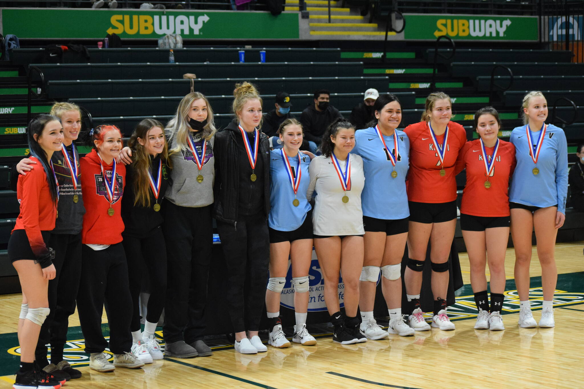 The all-team is announced at the end of the 3A state volleyball championships at the Alaska Airlines Center in Anchorage on Saturday, Nov. 13, 2021. (Camille Botello/Peninsula Clarion)
