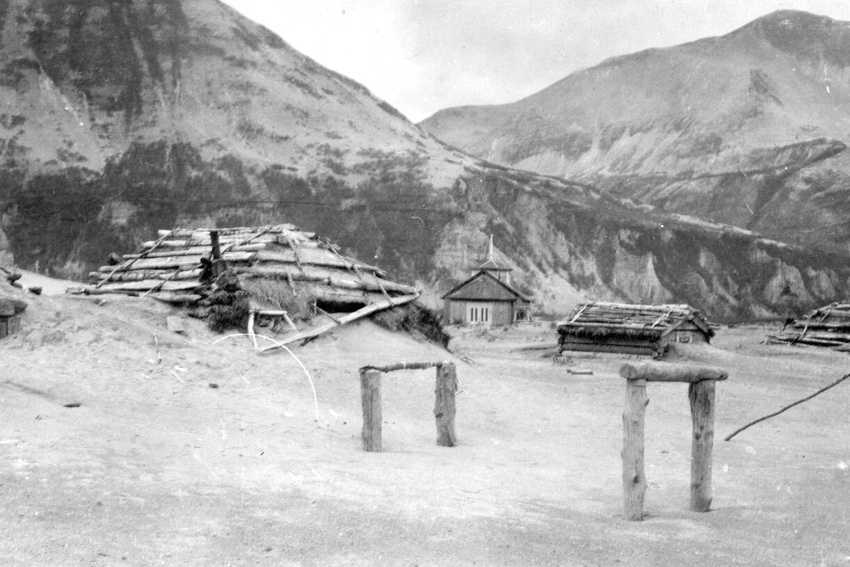 This June 1912, file photo provided by the U.S. Geological Survey shows ash drifts around Katmai village’s then-new Russian Orthodox church after the eruption of Novarupta Volcano in Katmai National Park and Preserve in Alaska. An unusual alert was issued by volcano scientists Wednesday, Nov. 17, 2021, warning that an ash cloud was headed toward Alaska’s Kodiak Island. The ash is from the powerful 1912 eruption of Novarupta, a volcano on the Alaska Peninsula that dropped volcanic ash that is still visible today. (G.C. Martin/U.S. Geological Survey via AP, File)