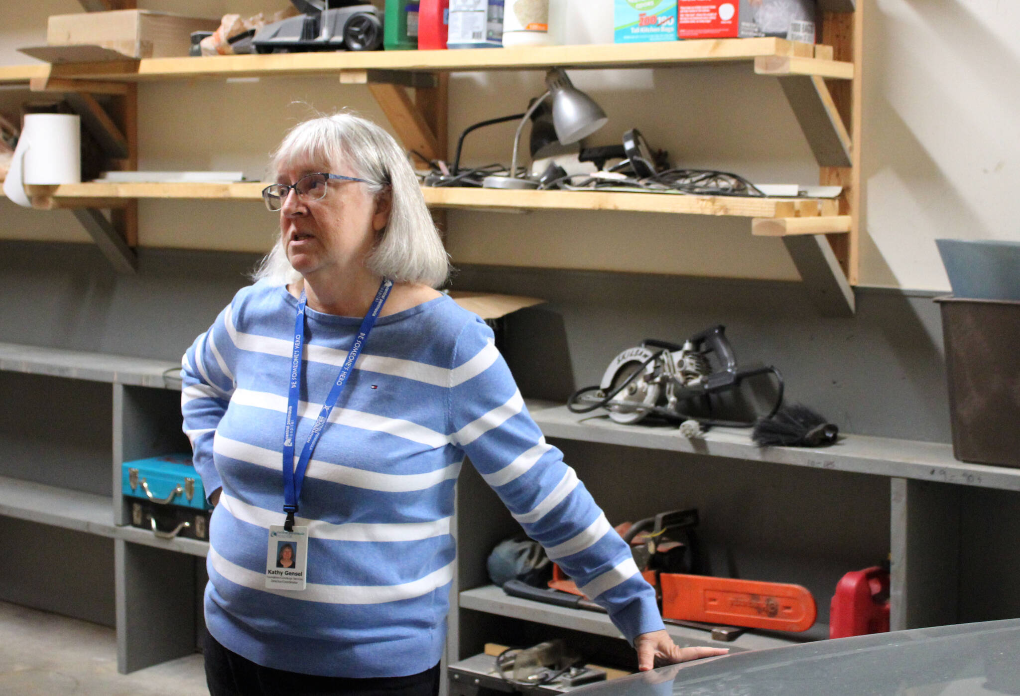 Kathy Gensel, president of Bridges Community Resource Network, Inc., stands in a garage at a cold weather shelter set to open next month on Monday, Nov. 22, 2021 in Nikiski, Alaska. (Ashlyn O’Hara/Peninsula Clarion)