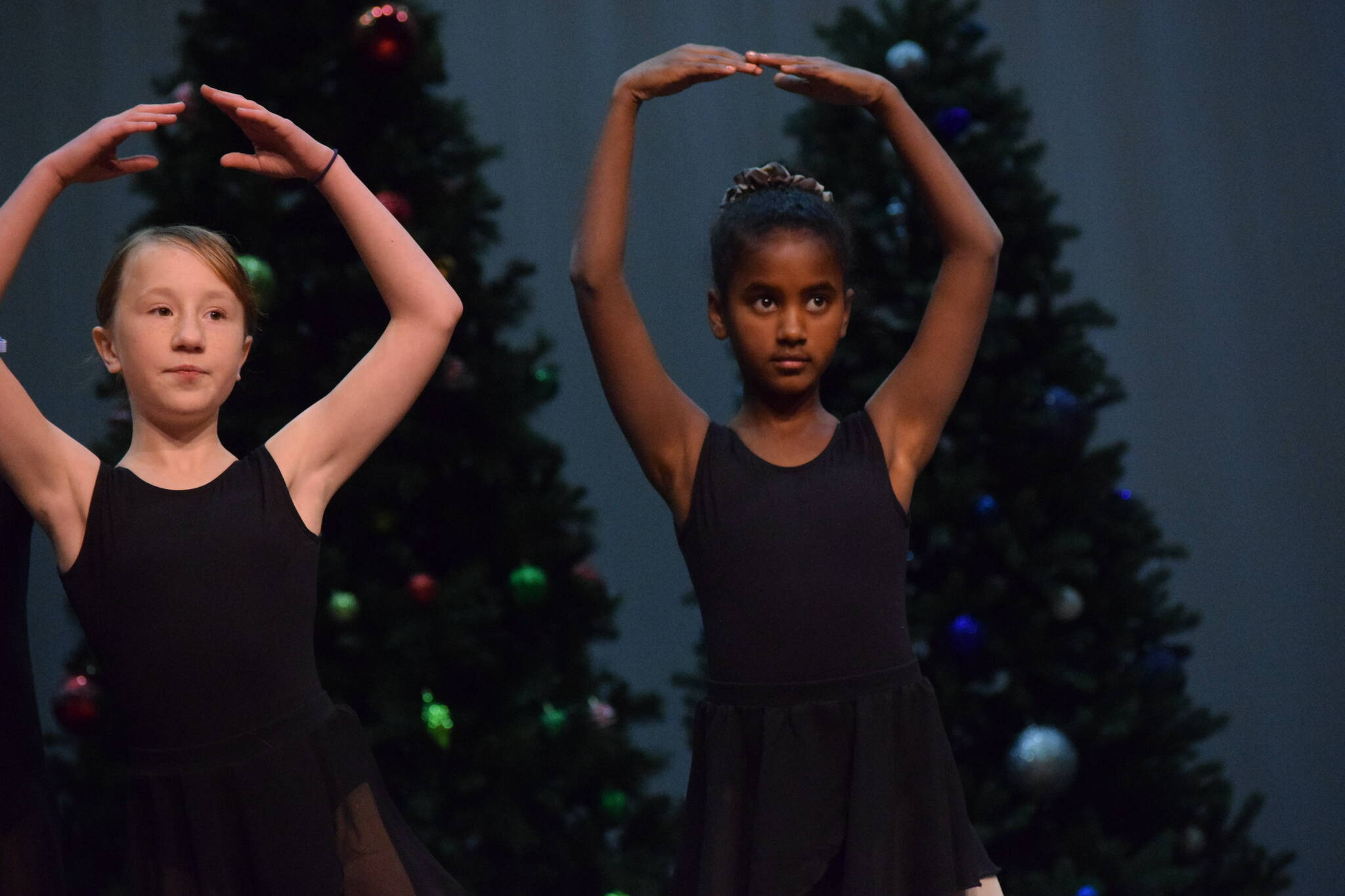 Forever Dance students practice for the “Forever Christmas” annual holiday variety show at Kenai Central High School on Tuesday, Nov. 23, 2021. (Camille Botello/Peninsula Clarion)