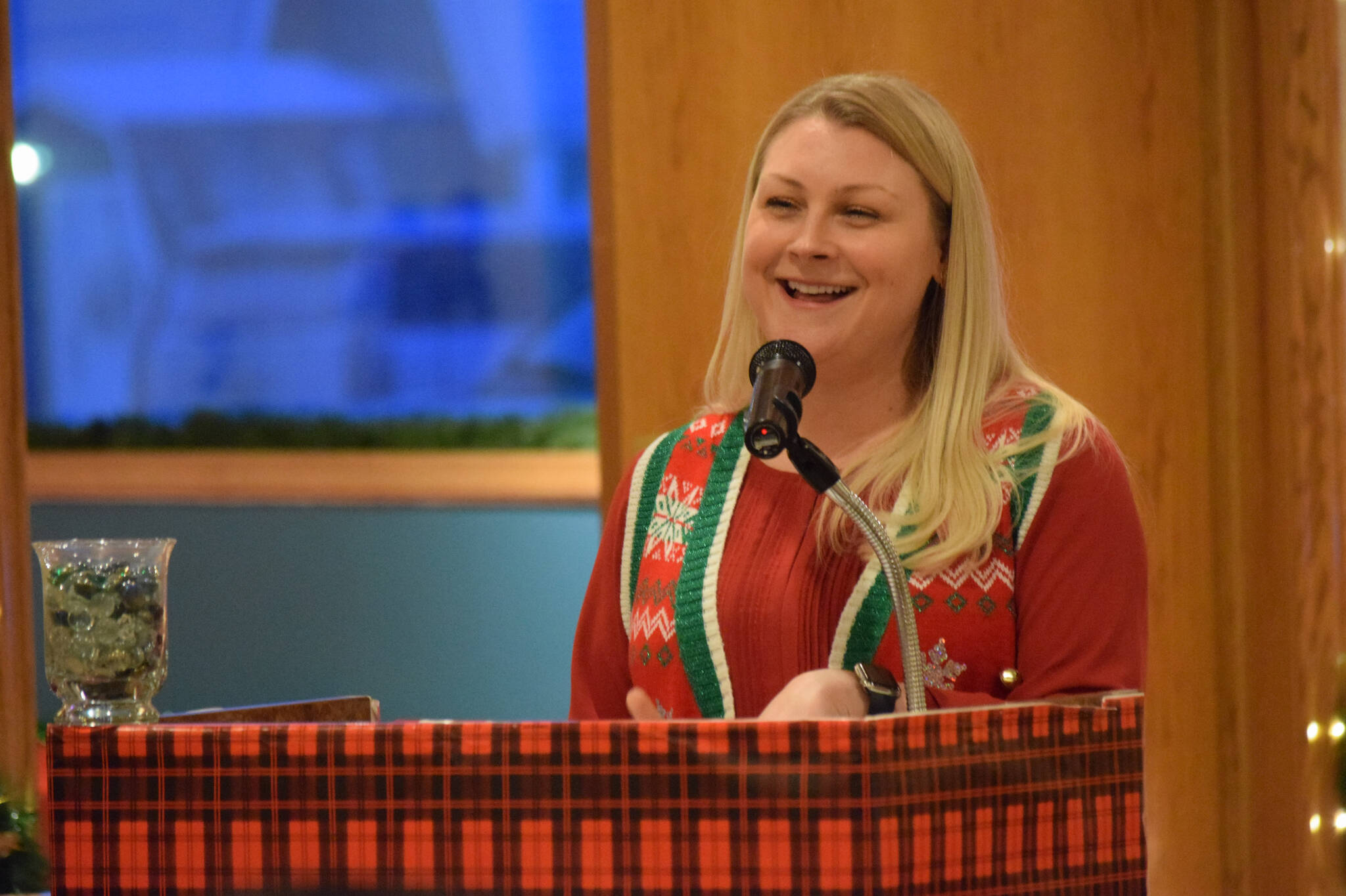 Kelly Martin speaks at the Kenai Peninsula Association of Realtors award ceremony at Kenai Catering on Thursday, Dec. 9, 2021. (Camille Botello/Peninsula Clarion)