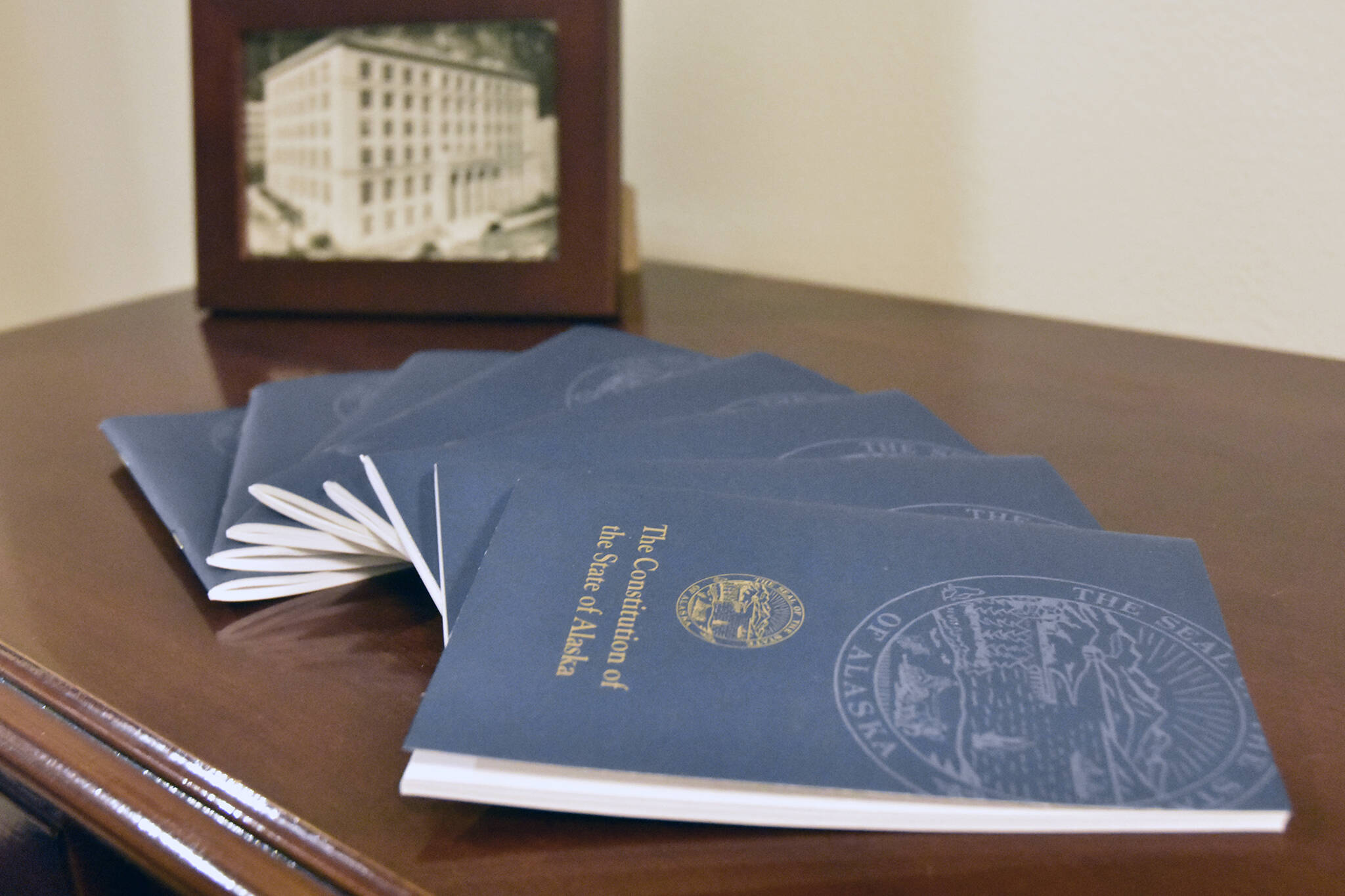 Copies of the Alaska State Constitution were available outside the Lt. Governor’s office on Monday, Dec. 13, 2021. If voters choose to have a constitutional convention next year, the state’s foundational document could be rewritten entirely. (Peter Segall / Juneau Empire)