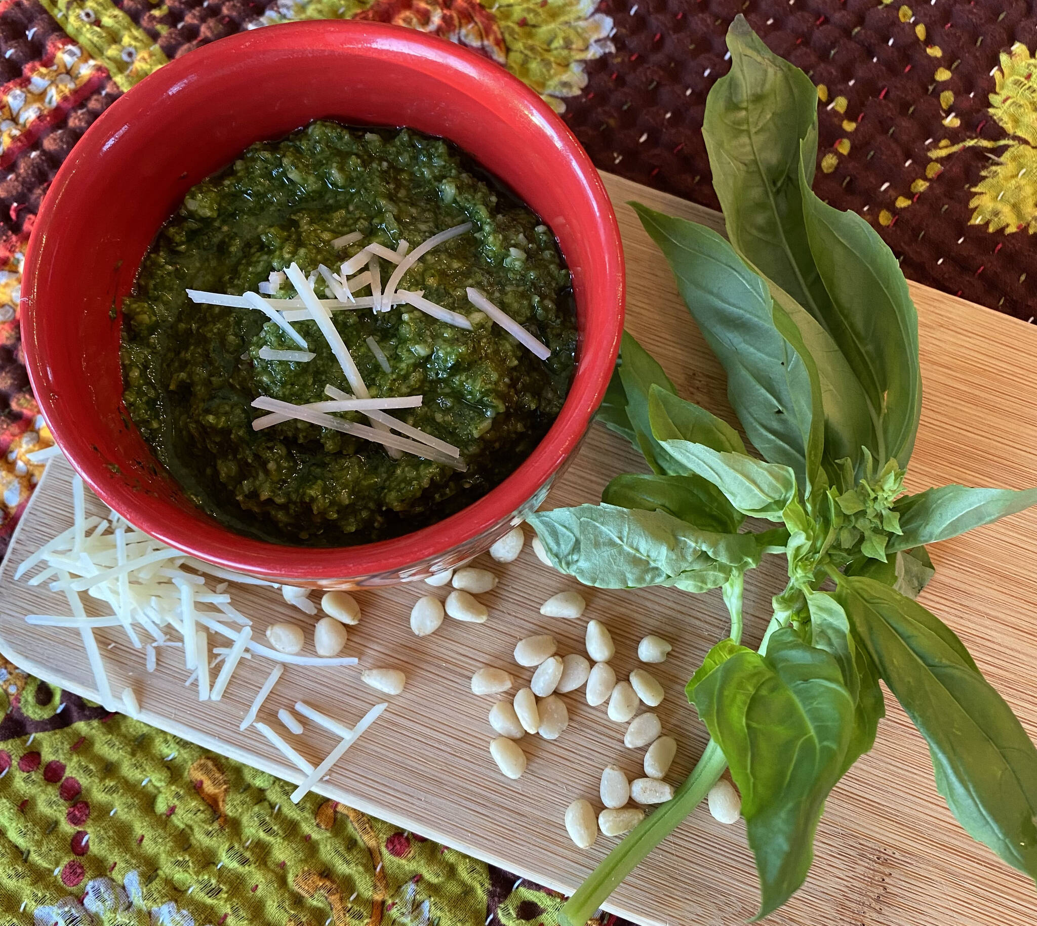Basil, Parmesan, pine nuts and olive oil come together to make a fragrant pesto. (Photo by Tressa Dale/Peninsula Clarion)
