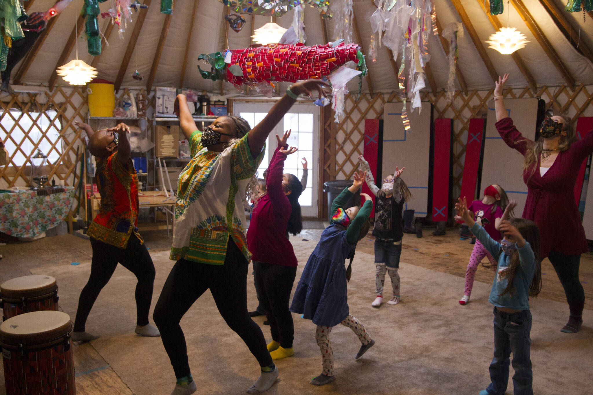 Sankofa Dance Theater Alaska teaches the Fireweed Academy Kindergarten class traditional African dances during their residency on Dec. 9. (Photo by Sarah Knapp/Homer News)