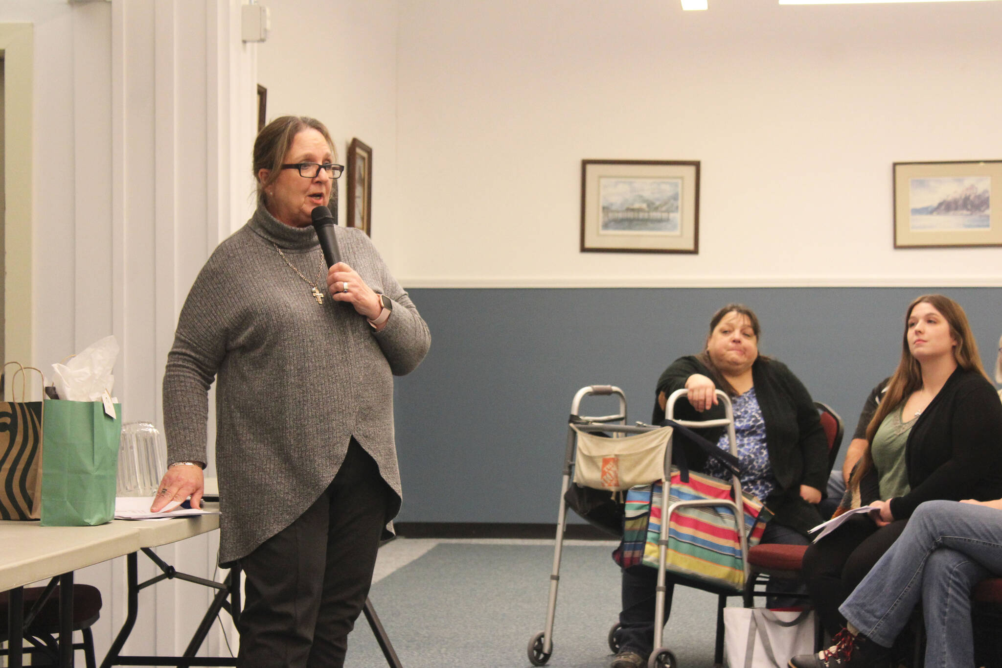 Love INC of the Kenai Peninsula Executive Director Leslie Rohr fields questions from community members during a town hall to discuss a cold weather shelter in Nikiski on Wednesday, Dec. 15, 2021 in Nikiski, Alaska. (Ashlyn O’Hara/Peninsula Clarion)