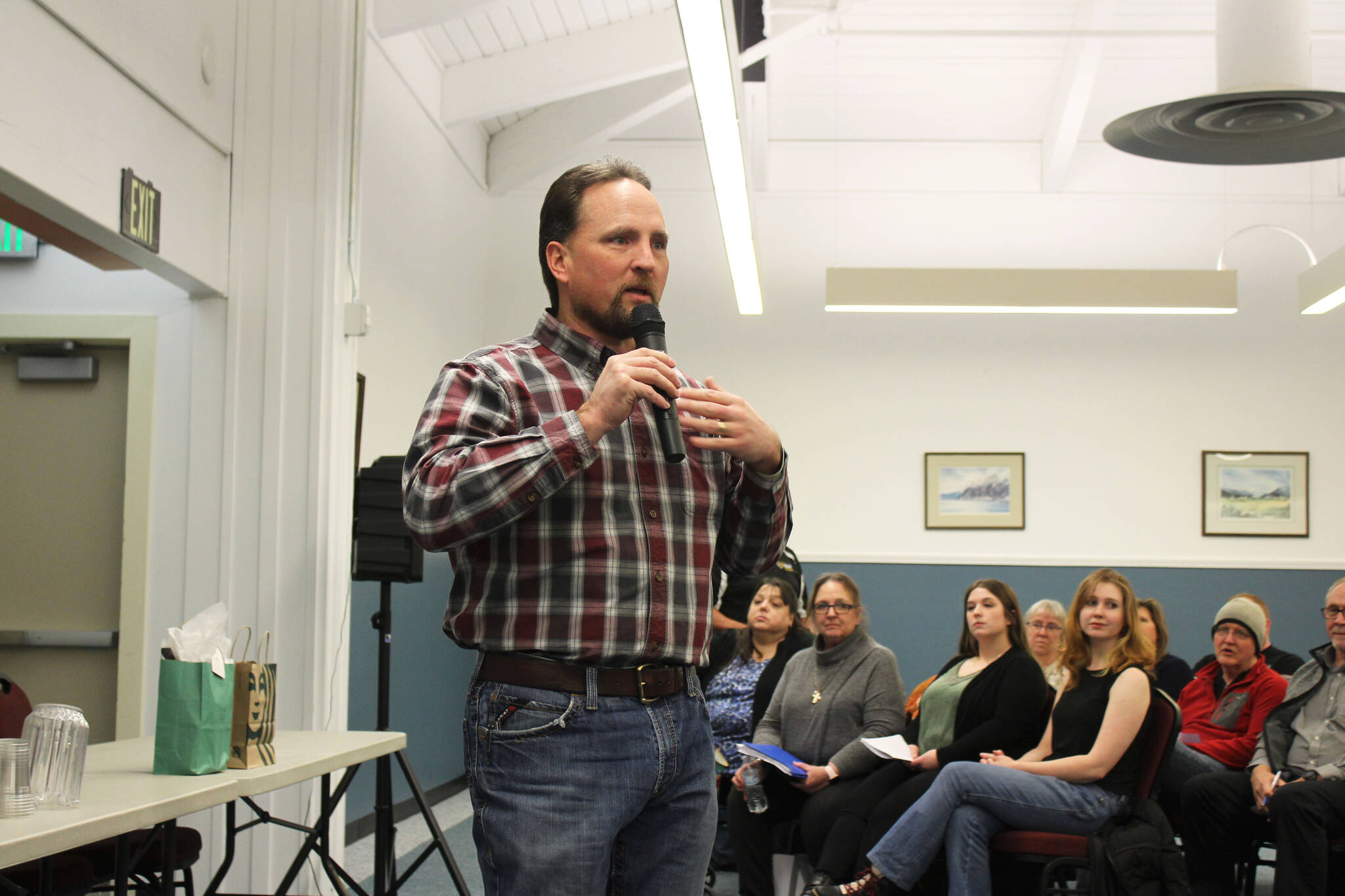 Rep. Ben Carpenter facilitates a town hall in Nikiski, Alaska, about a new cold weather shelter in the community on Wednesday, Dec. 15, 2021. (Ashlyn O’Hara/Peninsula Clarion)