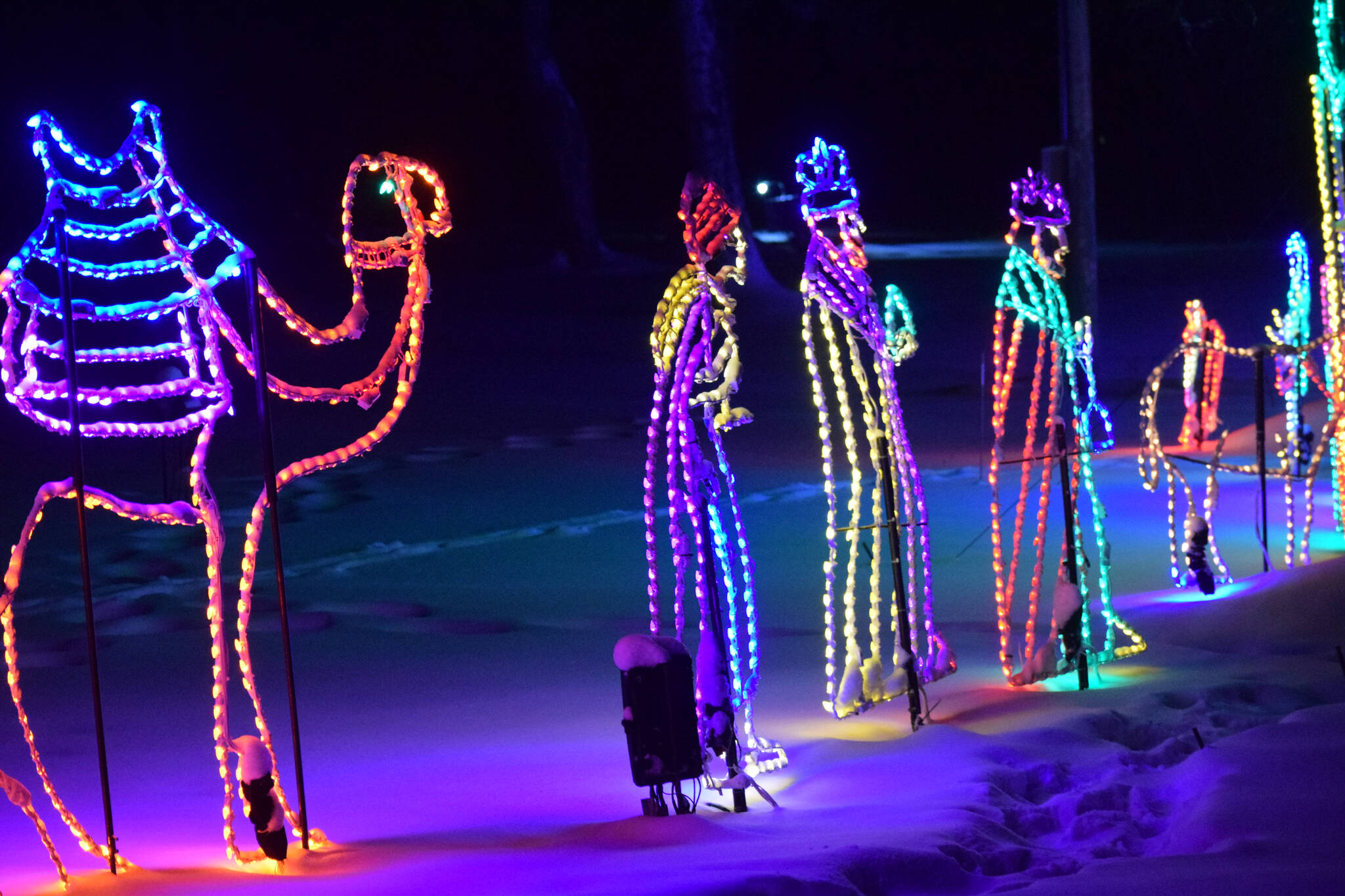 Lighted figures are displayed in the yard of Robin and Jim Allemann as part of the couple’s annual Christmas show, in Nikiski on Sunday, Dec. 19, 2021. (Camille Botello/Peninsula Clarion)
