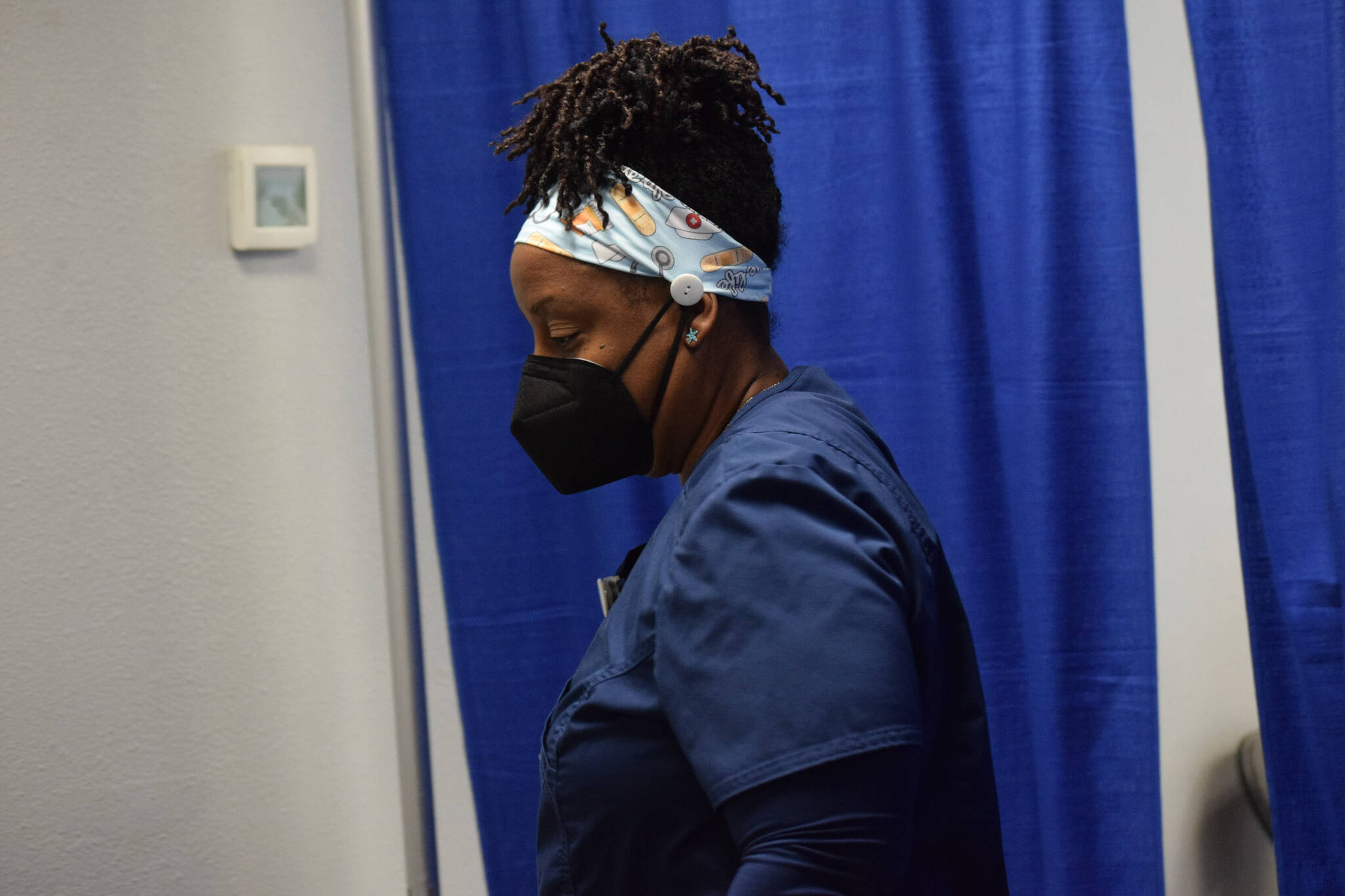 Registered nurse Tina Williams works at the “Y” vaccine clinic in Soldotna on Wednesday, Dec. 22, 2021. (Camille Botello/Peninsula Clarion)