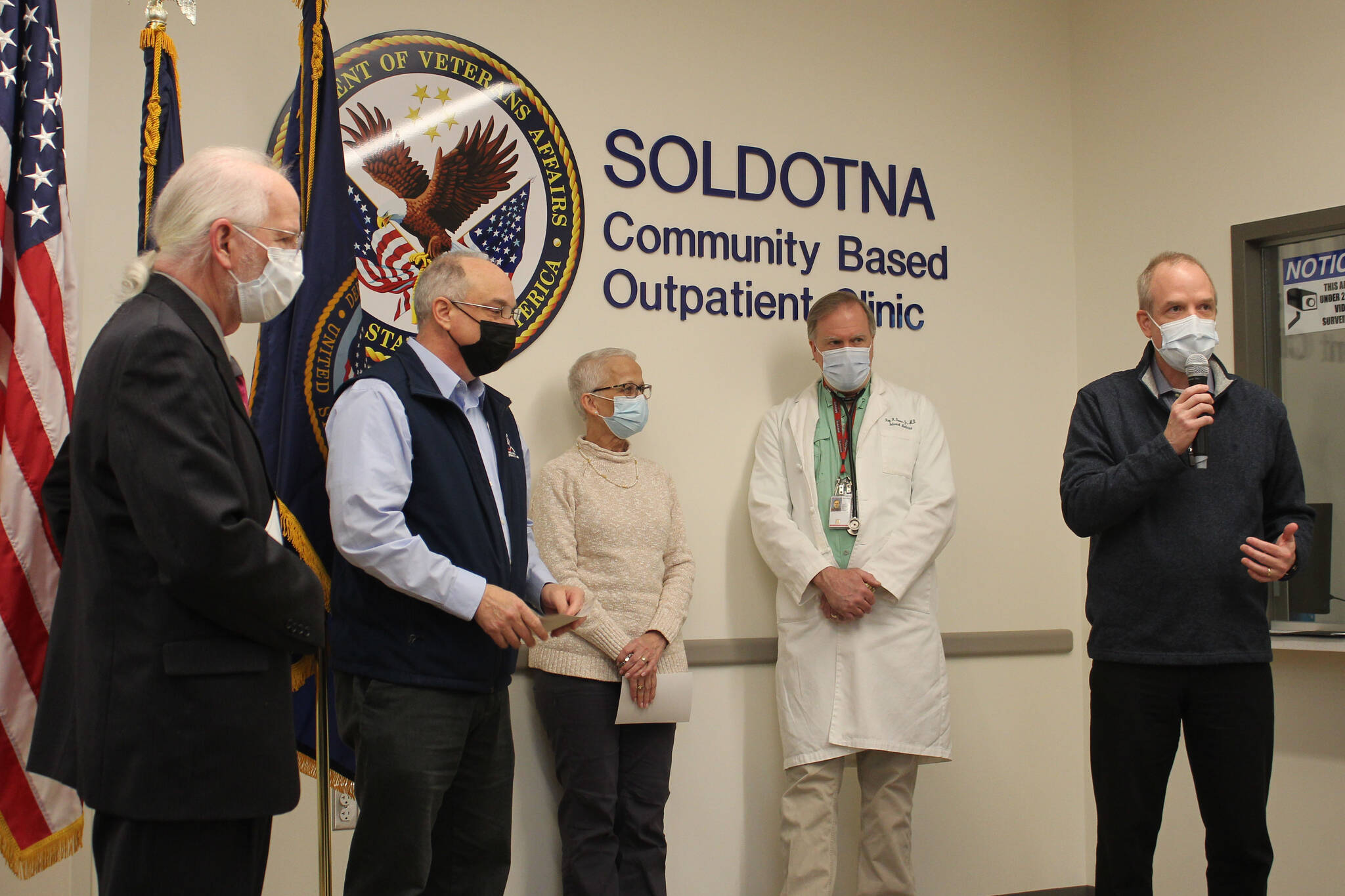 From left, Soldotna Mayor Paul Whitney, Alaska Office of Veterans Affair Director Verdie Bowen, Dr. Teresa Boyd, a doctor and Tom Steinbrunner attend a ribbon cutting ceremony at the Soldotna Community Based Outpatient Clinic on Wednesday, Dec. 29, 2021 in Soldotna, Alaska. (Ashlyn O’Hara/Peninsula Clarion)