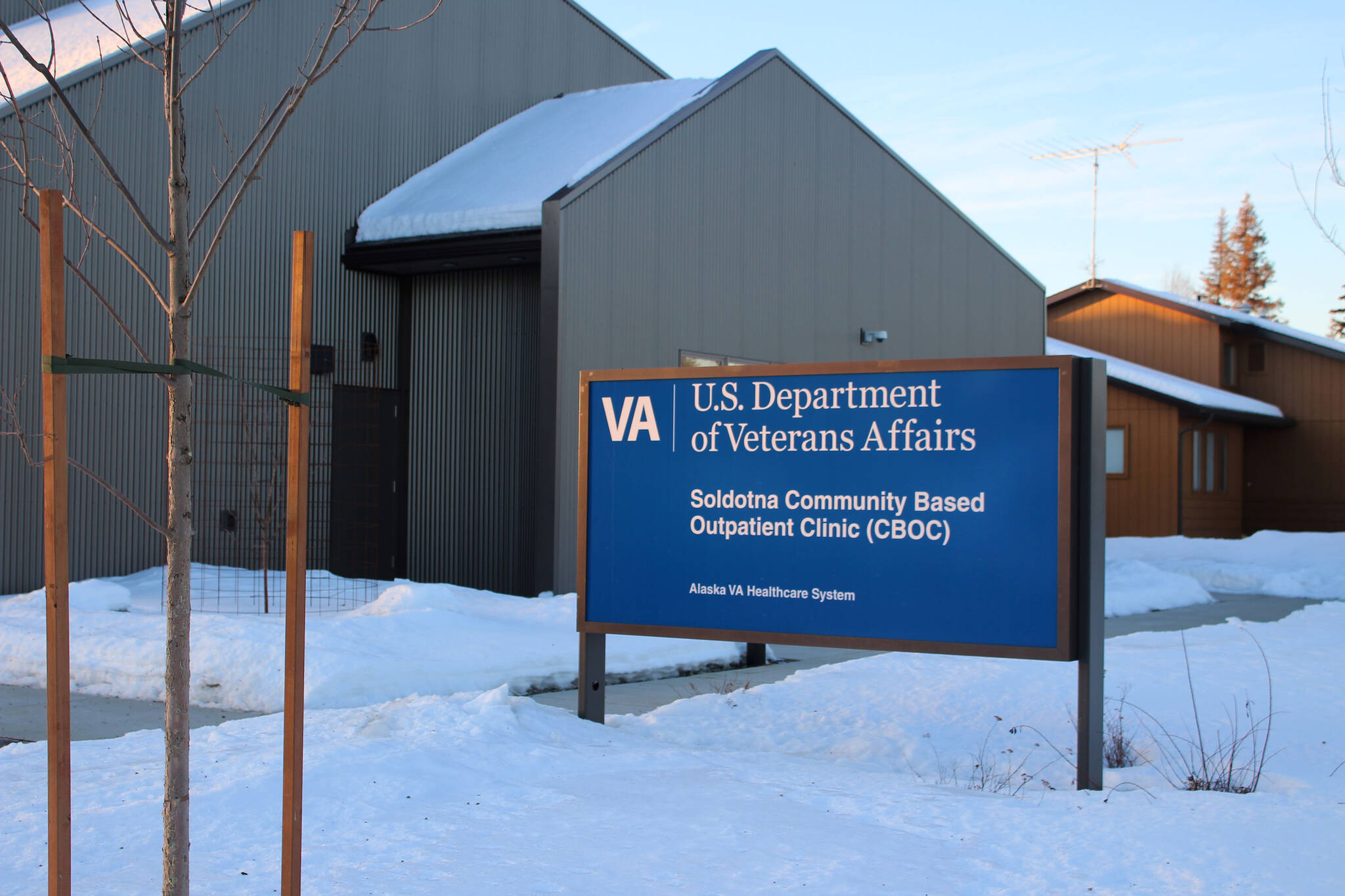 Signage indicates the entrance of the Soldotna Community Based Outpatient Clinic on Wednesday, Dec. 29, 2021 in Soldotna, Alaska. (Ashlyn O’Hara/Peninsula Clarion)