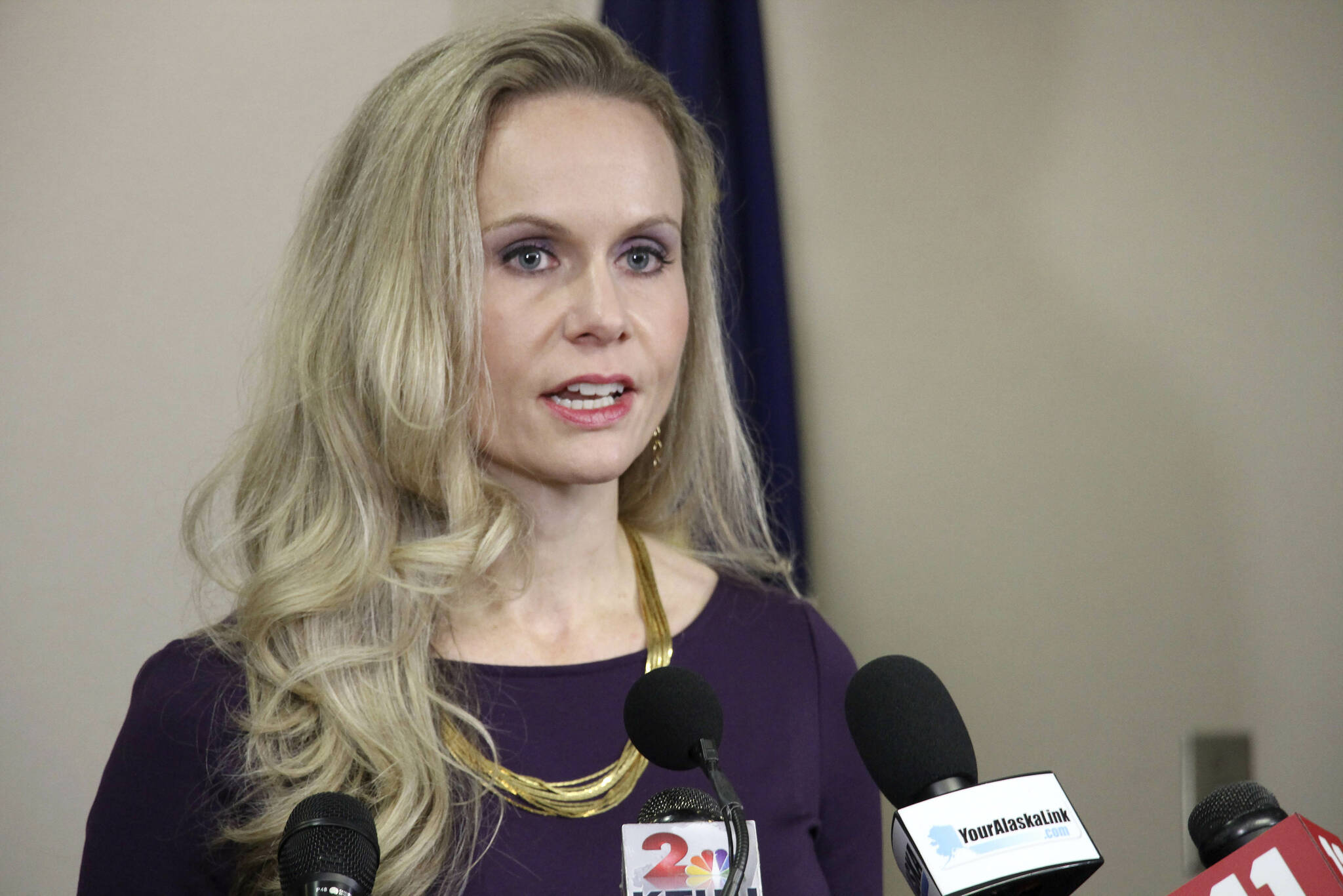 In this Sept. 26, 2019 file photo, Alaska Department of Administration Commissioner Kelly Tshibaka addresses reporters in Anchorage, Alaska. Tshibaka announced plans on Monday, March 29, 2021, to run for the U.S. Senate seat held by U.S. Sen. Lisa Murkowski, a fellow Republican, in the 2022 election. (AP Photo/Mark Thiessen)