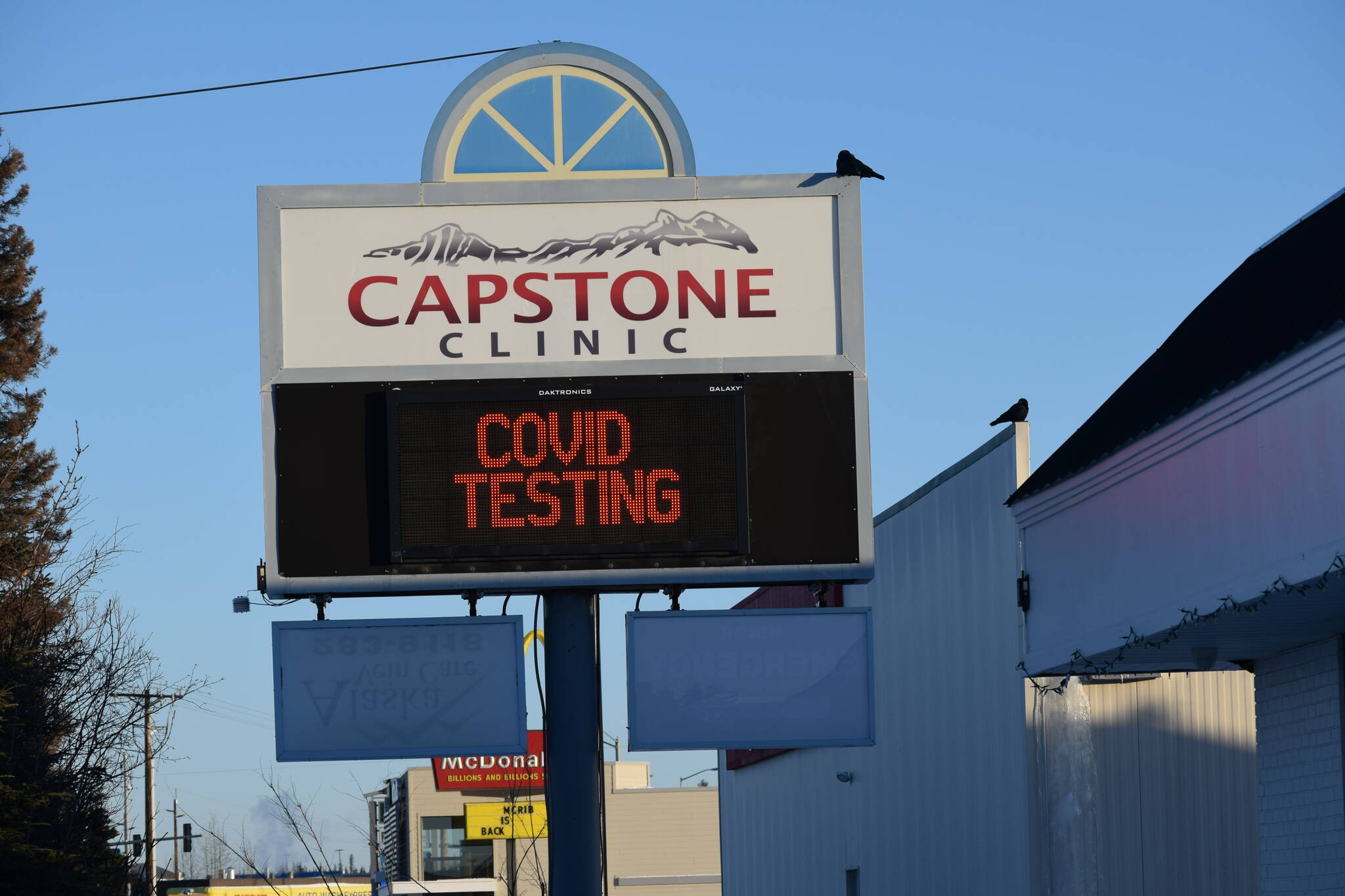 A sign advertising testing for COVID-19 is seen at Capstone Clinic in Kenai, Alaska, on Tuesday, Jan. 4, 2022. (Camille Botello/Peninsula Clarion)