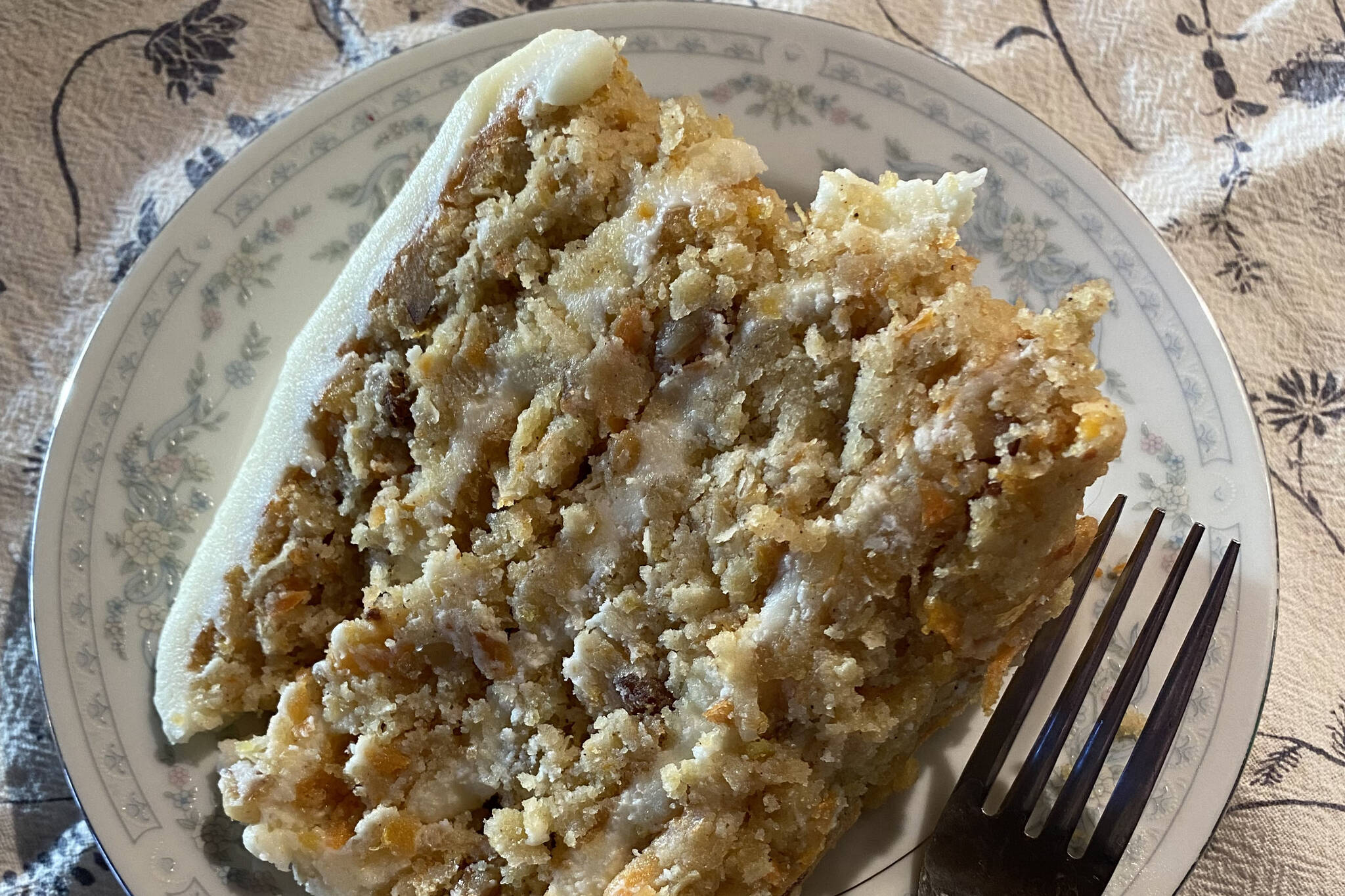 Almond flour adds a nuttiness to this carrot cake topped with cream cheese frosting. (Photo by Tressa Dale/Peninsula Clarion)