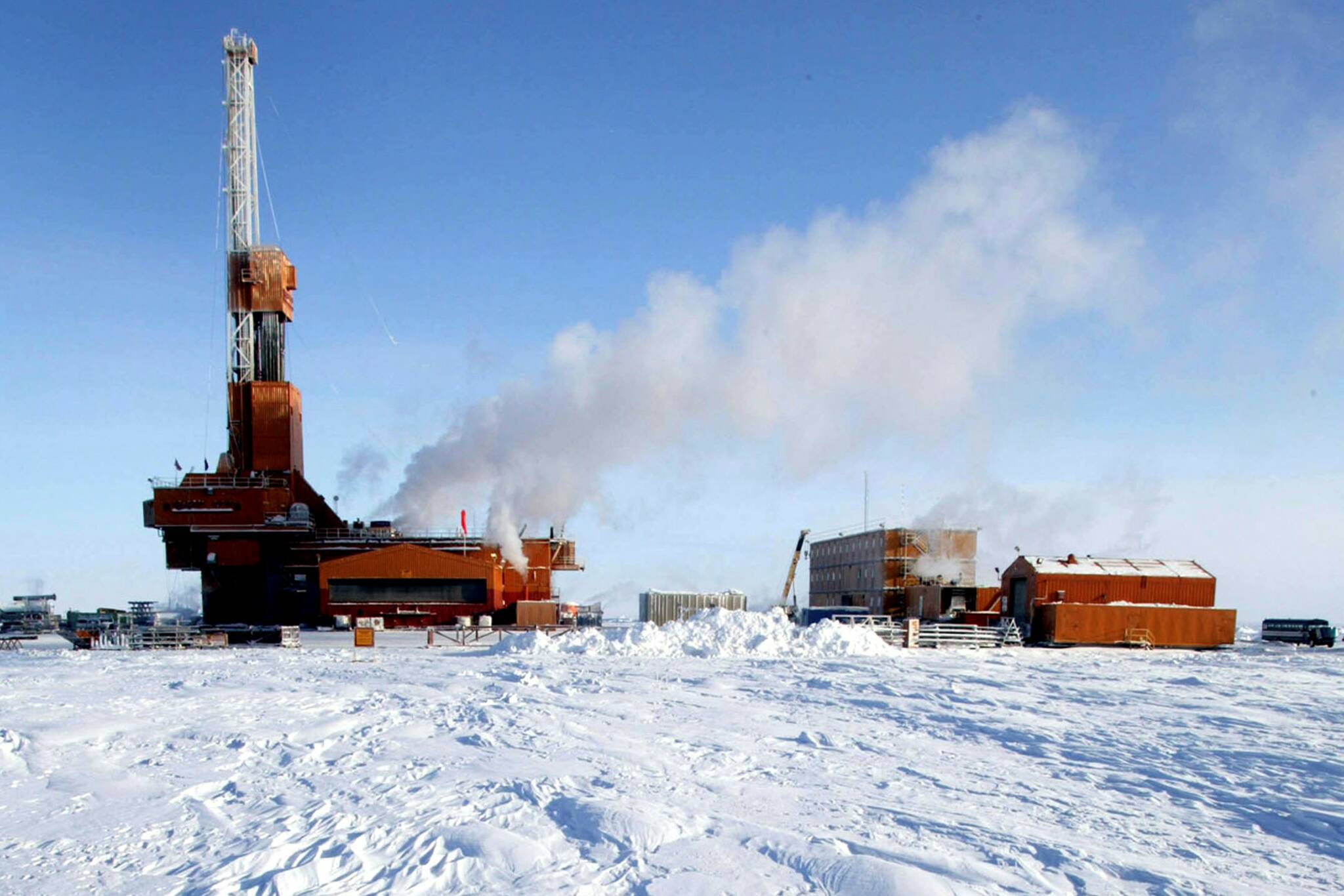 FILE--In this undated file photo, drilling operations at the Doyon Rig 19 at the Conoco-Phillips Carbon location in the National Petroleum Reserve, Alaska, are shown. Alaska's Congressional delegation released a joint statement Tuesday condemning the Biden Administration's decision not to pursue development on the reserve, saying it would hurt the state's economy. (AP Photo/Judy Patrick, File)