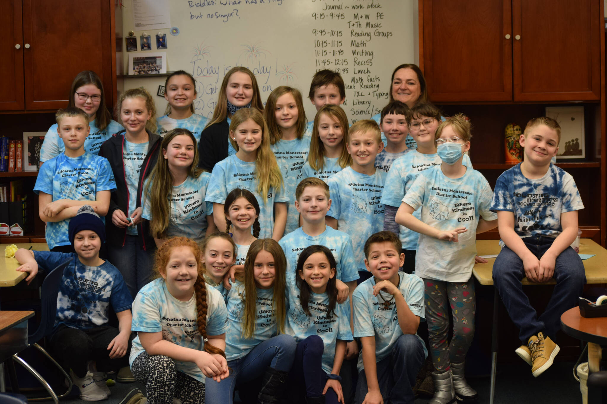 Terri Carter’s class celebrates the National Blue Ribbon award after their assembly at Soldotna Montessori Charter School on Friday, Jan 14, 2022. (Camille Botello / Peninsula Clarion)