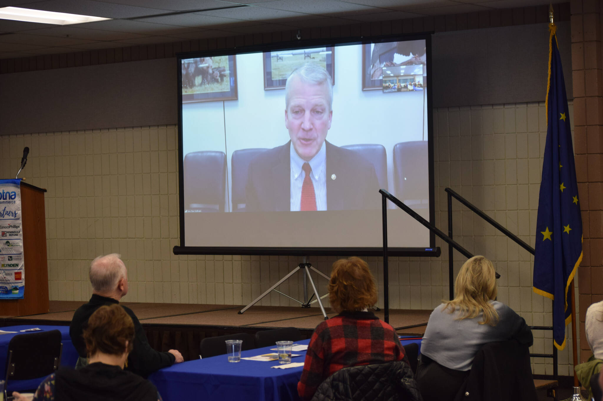 Members of the Kenai and Soldotna chambers of commerce listen to a briefing by Alaska Sen. Dan Sullivan during a joint luncheon at the Soldotna Sports Complex on Tuesday, Jan. 18, 2022. (Camille Botello/Peninsula Clarion)