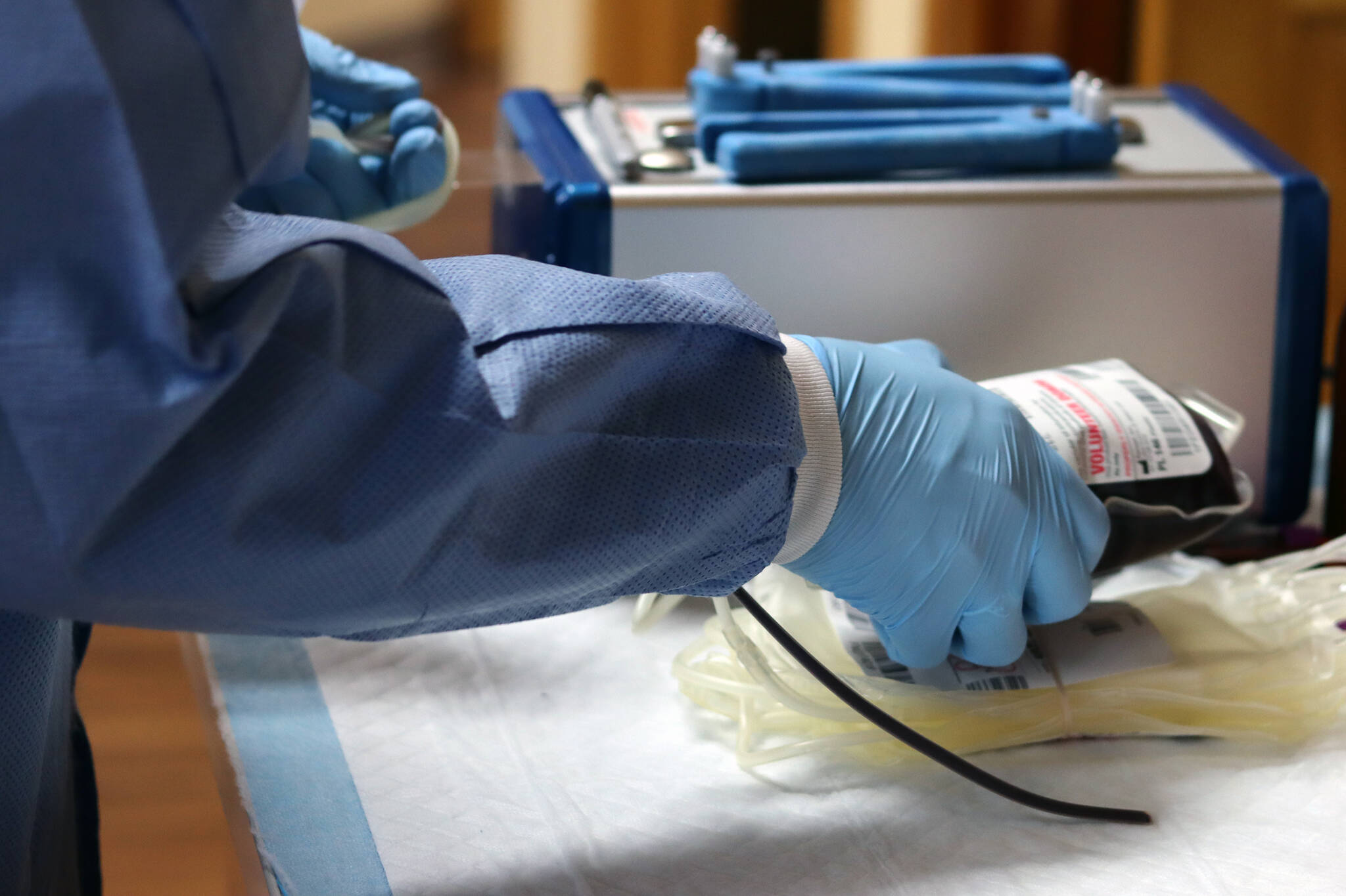 Donated blood is prepared for storage and eventual transport at the Blood Bank of Alaska’s Juneau location. There is a statewide shortage of donated blood. (Ben Hohenstatt / Juneau Empire)