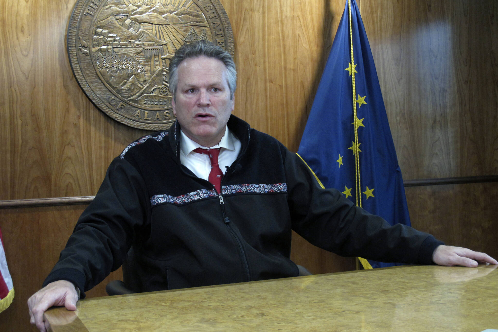 Alaska Gov. Mike Dunleavy speaks with reporters during a news briefing on Tuesday, Sept. 14, 2021, in Juneau, Alaska. Dunleavy said he doesn’t see his acceptance of former President Donald Trump’s endorsement as hurting his relationship with the state’s senior U.S. senator, Republican Lisa Murkowski, who voted to convict Trump at his impeachment trial last year and whom Trump has vowed to fight in her reelection bid. (AP Photo/Becky Bohrer,File)