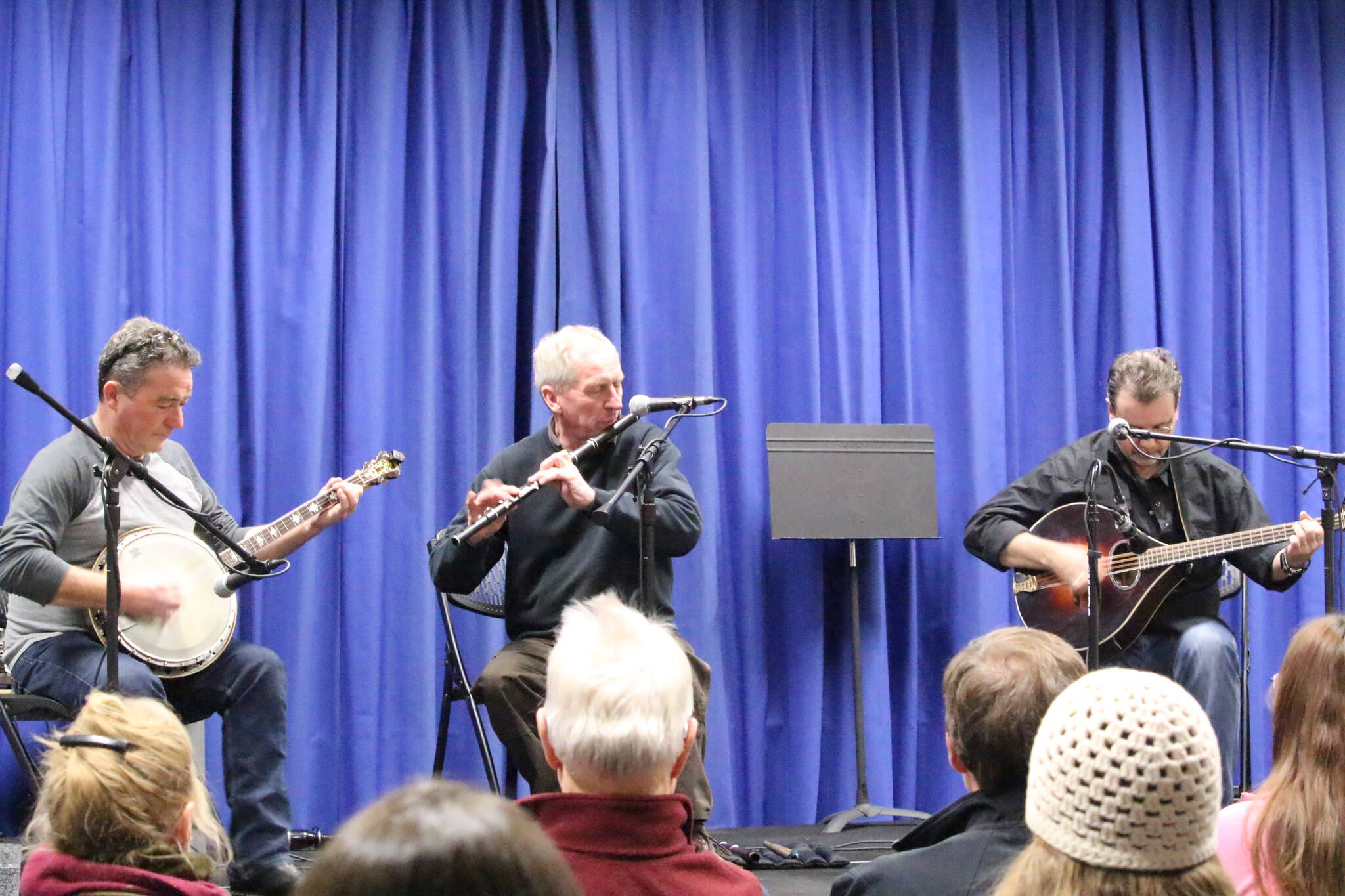 From left, John Walsh, John Skelton and Pat Broaders perform at the annual Winter Concert of Traditional Irish Music at Kenai Peninsula College in Kenai, Alaska, on Jan. 24, 2020. (Photo by Brian Mazurek/Peninsula Clarion)