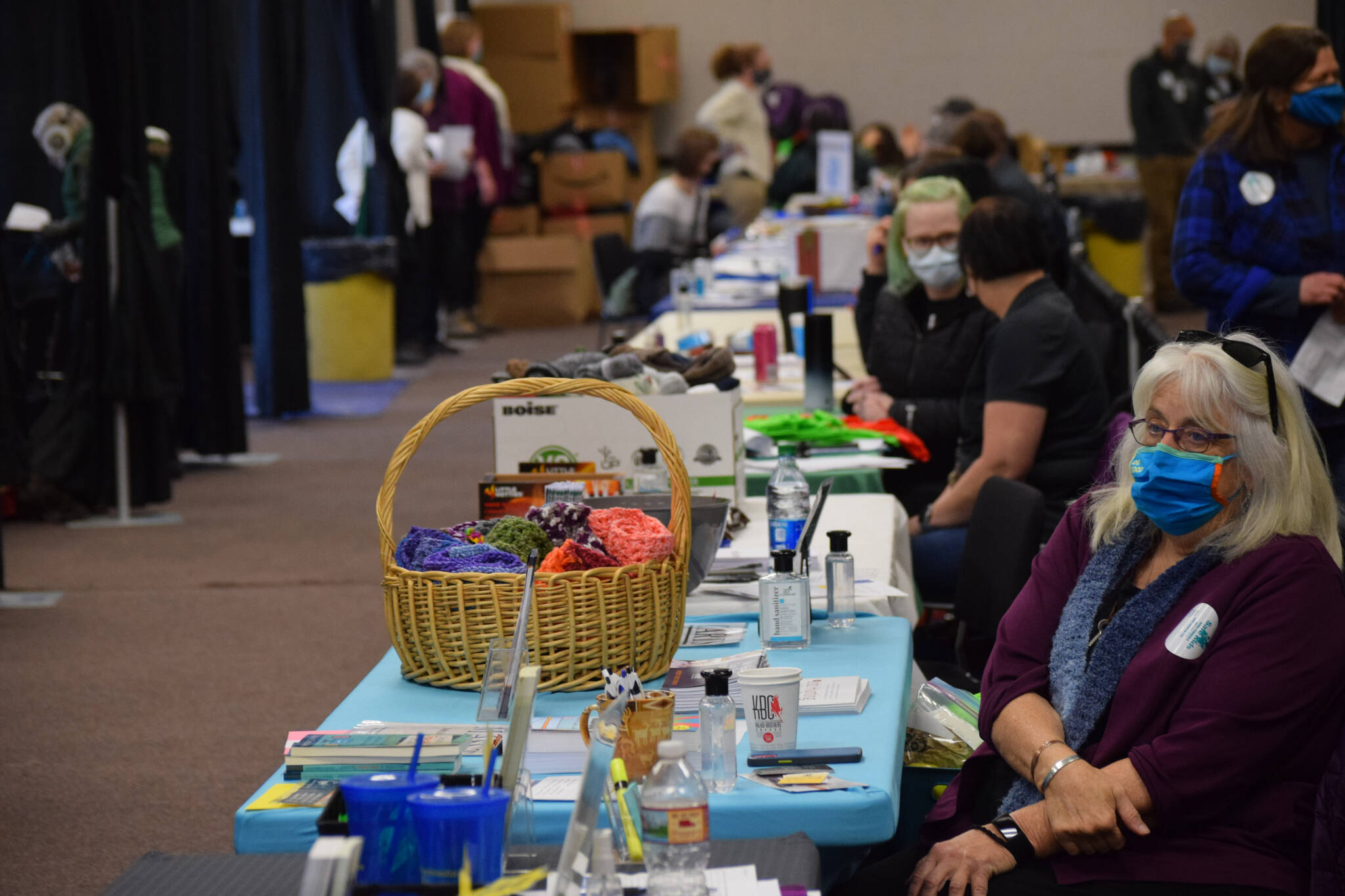 Community agencies administer social services to those in need during the Project Homeless Connect event Soldotna Regional Sports Complex in Soldotna on Wednesday, Jan. 26, 2022. (Camille Botello/Peninsula Clarion)