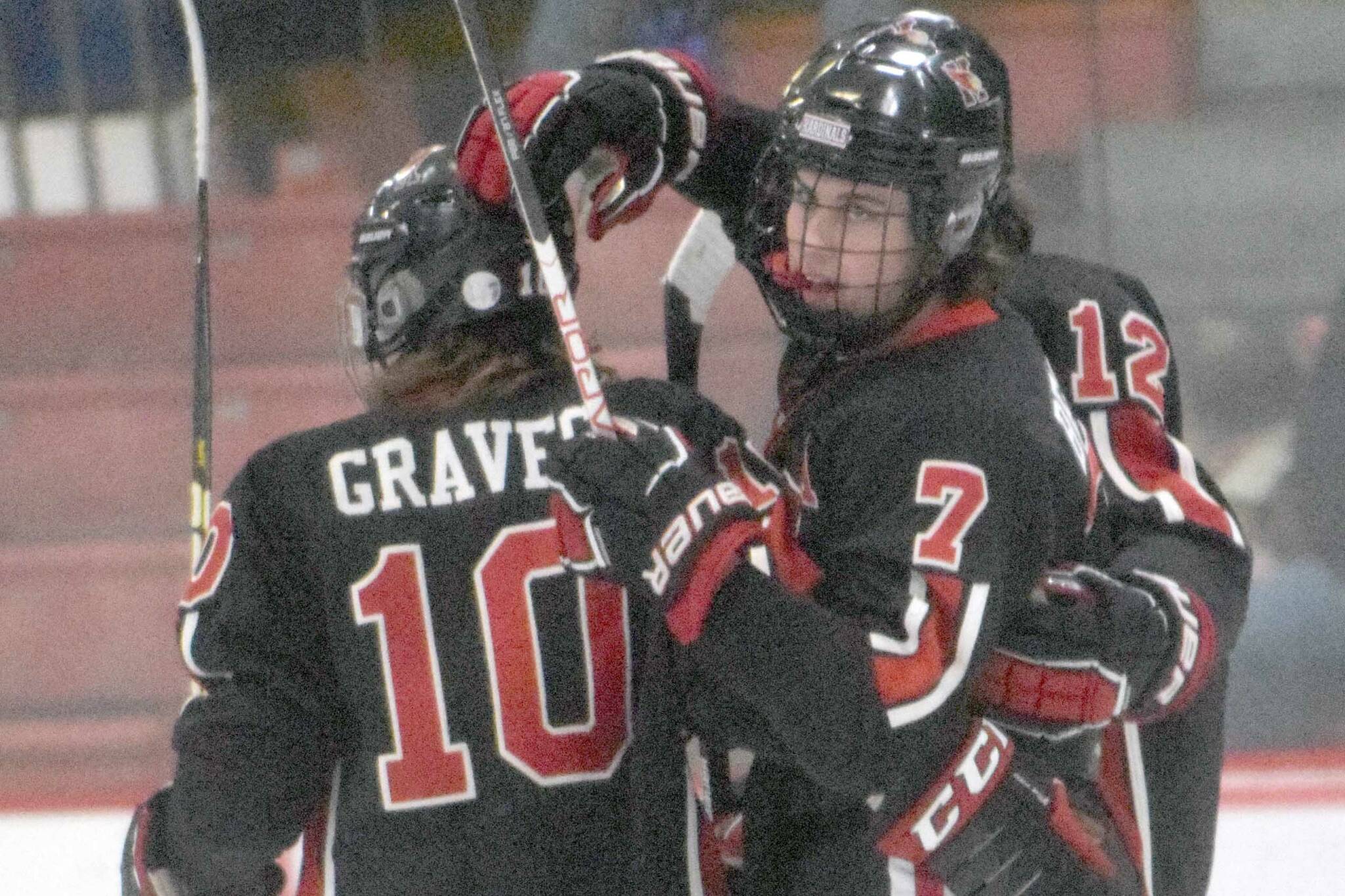Kenai Central’s Jacob Begich celebrates a goal against Soldotna on Thursday, Jan. 27, 2022, at the Soldotna Regional Sports Complex in Soldotna, Alaska. (Photo by Jeff Helminiak/Peninsula Clarion)