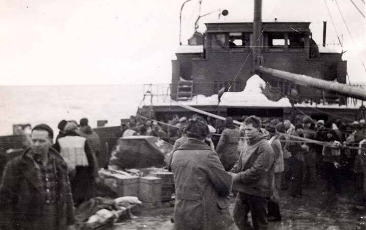 Photo from Seward Community Library Association collection in Alaska Digital Archives.
The individuals pictured here on a rescue barge are probably those plucked from the rocky beach by Jimmy Johnson and his power scow after the wreck of the S.S. Yukon in February 1946.