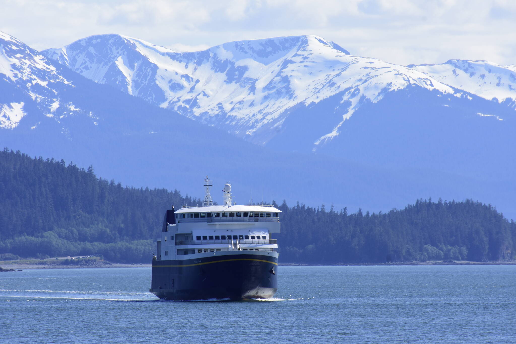 In this Empire file photo, the MV Tazlina heads in to dock in Juneau. The federal Bipartisan Infrastructure Legislation is poised to bring a lot of money to Alaska for things like ferries, but when and how much isn’t yet known as many of the programs are new. (Peter Segall / Juneau Empire file)