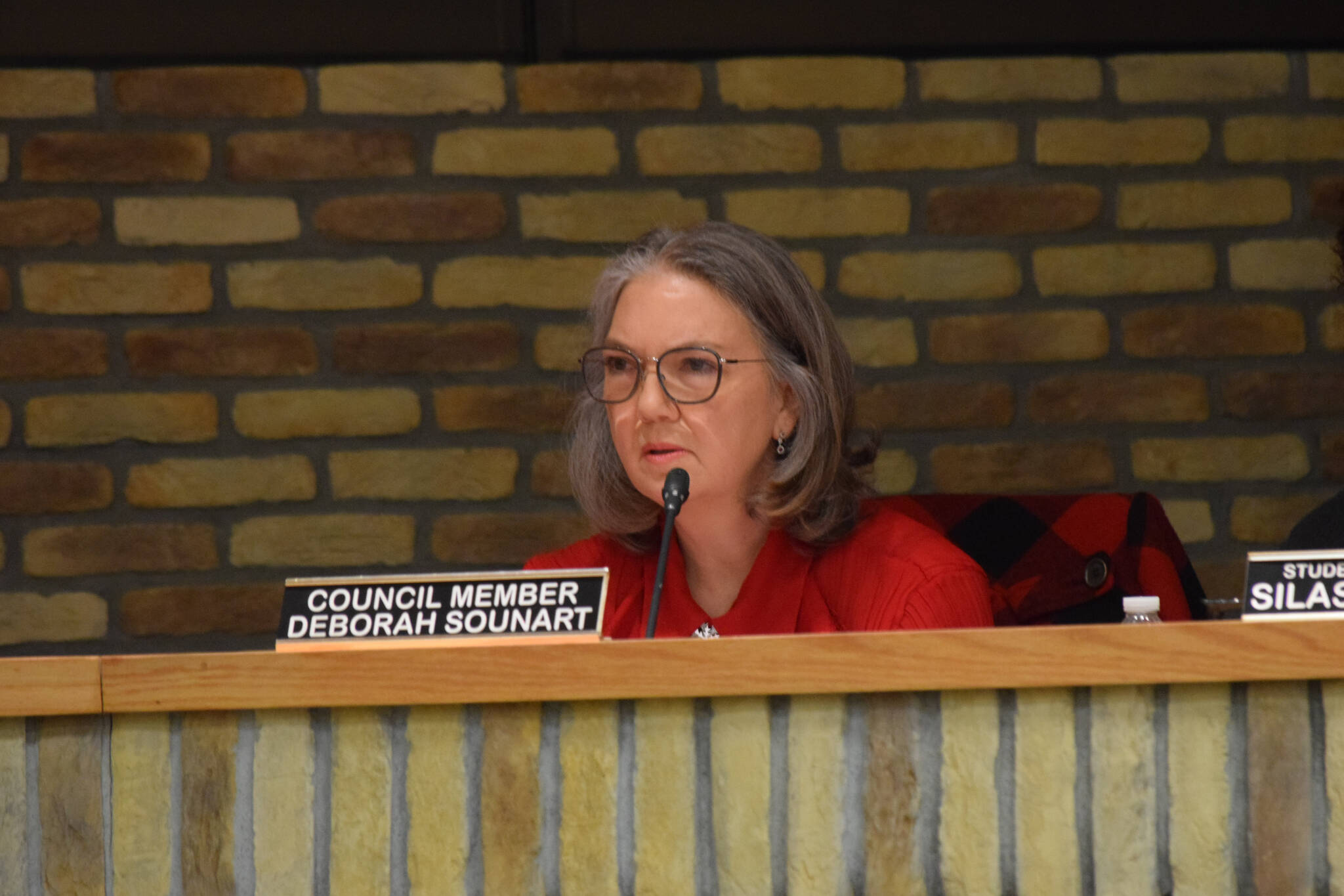 Kenai City Council member Deborah Sounart deliberates at the body’s regular meeting on Wednesday, Feb. 16, 2022. (Camille Botello/Peninsula Clarion)