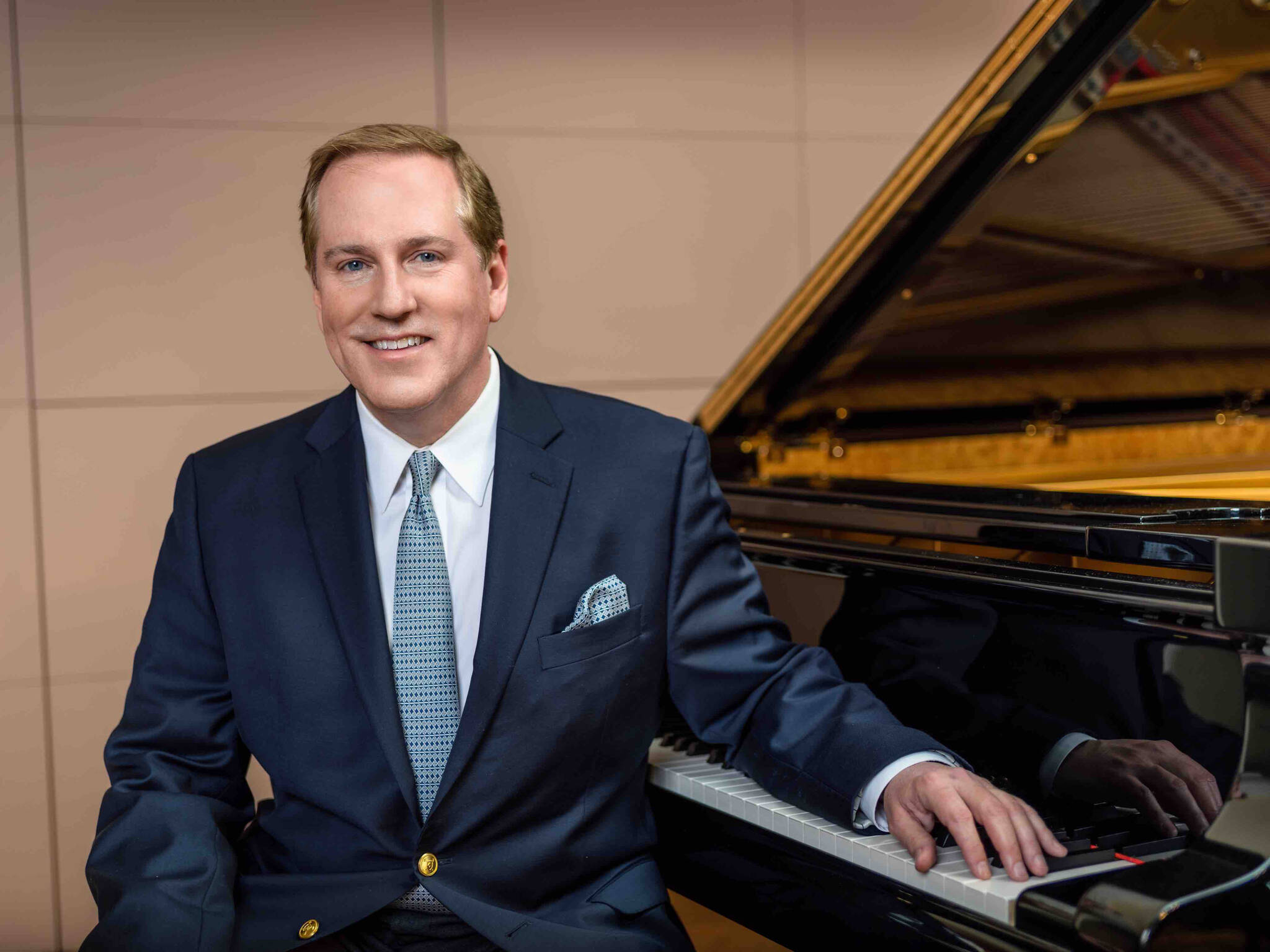 Richard Dowling poses with a piano. (Photo provided by Richard Dowling)