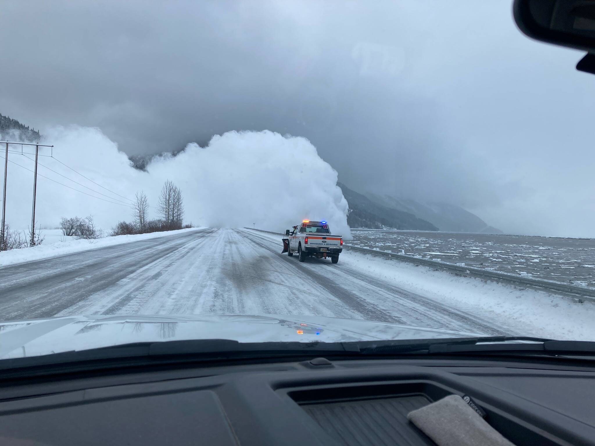 Alaska road maintenance crews conduct avalanche clearing work along the Seward Highway on Friday, Feb. 18, 2022 near Girdwood, Alaska. (Photo courtesy Alaska Department of Transportation and Public Facilities)