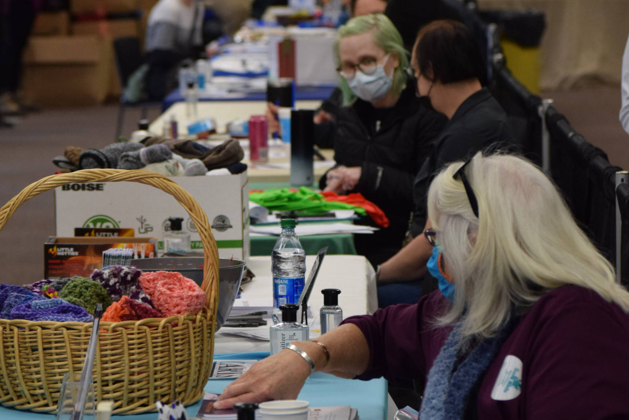 Community agencies administer social services during the Project Homeless Connect event at the Soldotna Regional Sports Complex in Soldotna, Alaska, on Wednesday, Jan. 26, 2022. (Camille Botello/Peninsula Clarion)