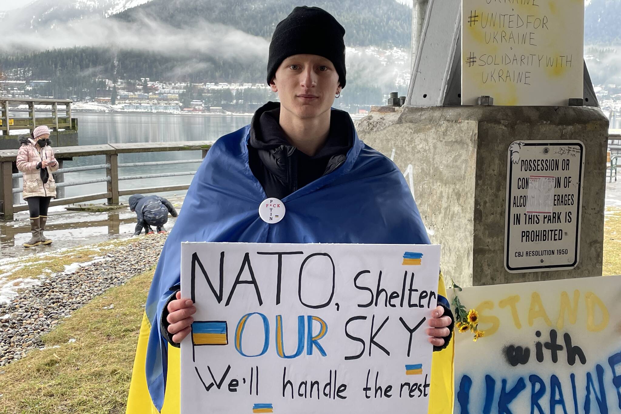 Michael S. Lockett / Juneau Empire
Viktor Tkachenko, who moved to Alaska from Ukraine last year, holds a sign asking NATO for assistance defeating Russian airpower at a protest against the war Saturday in Marine Park.