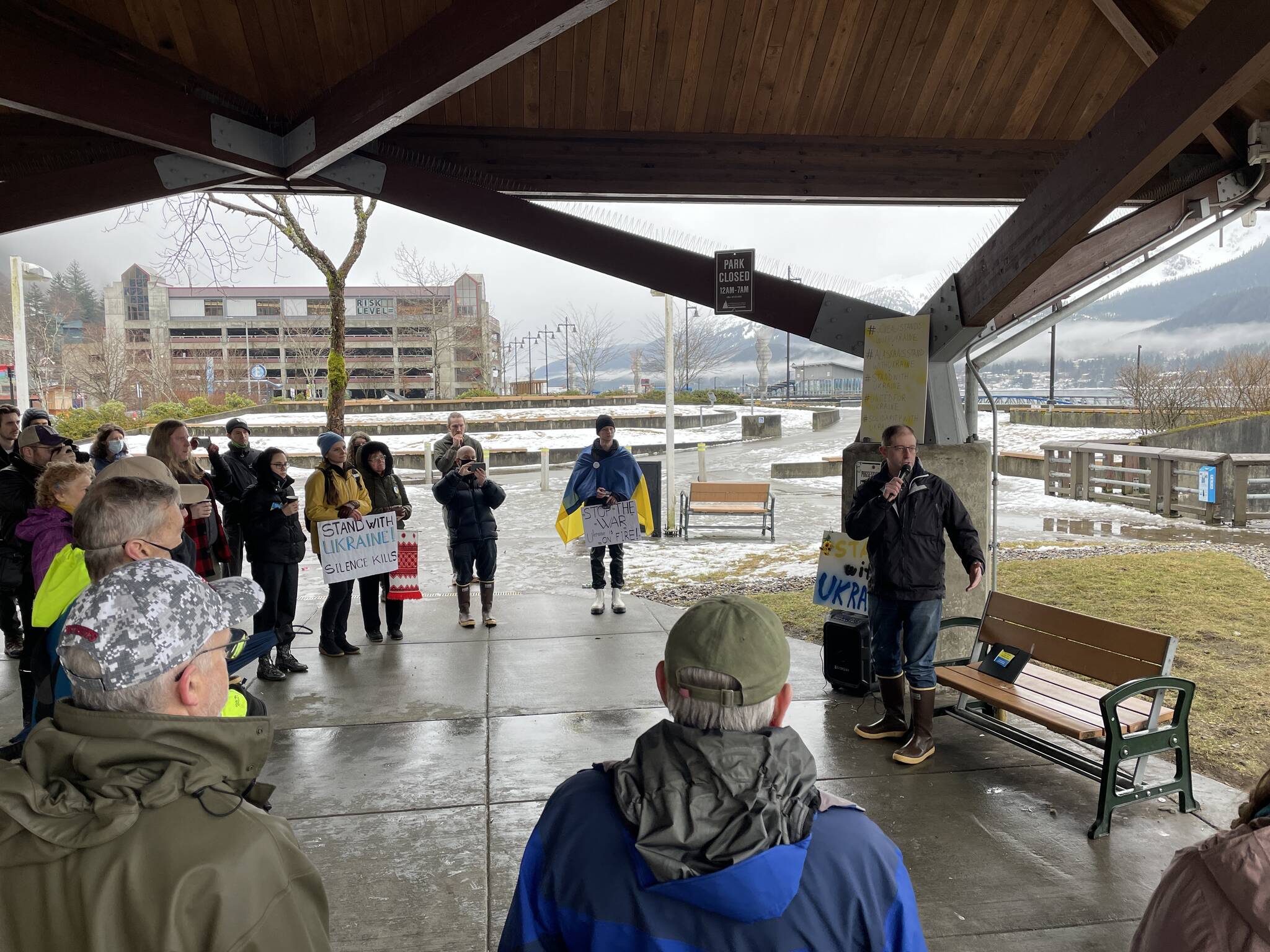 State Sen. Jesse Kiehl, D-Juneau, speaks during a protest against the Russian invasion of Ukraine in Marine Park on Feb. 26, 2022. (Michael S. Lockett / Juneau Empire)