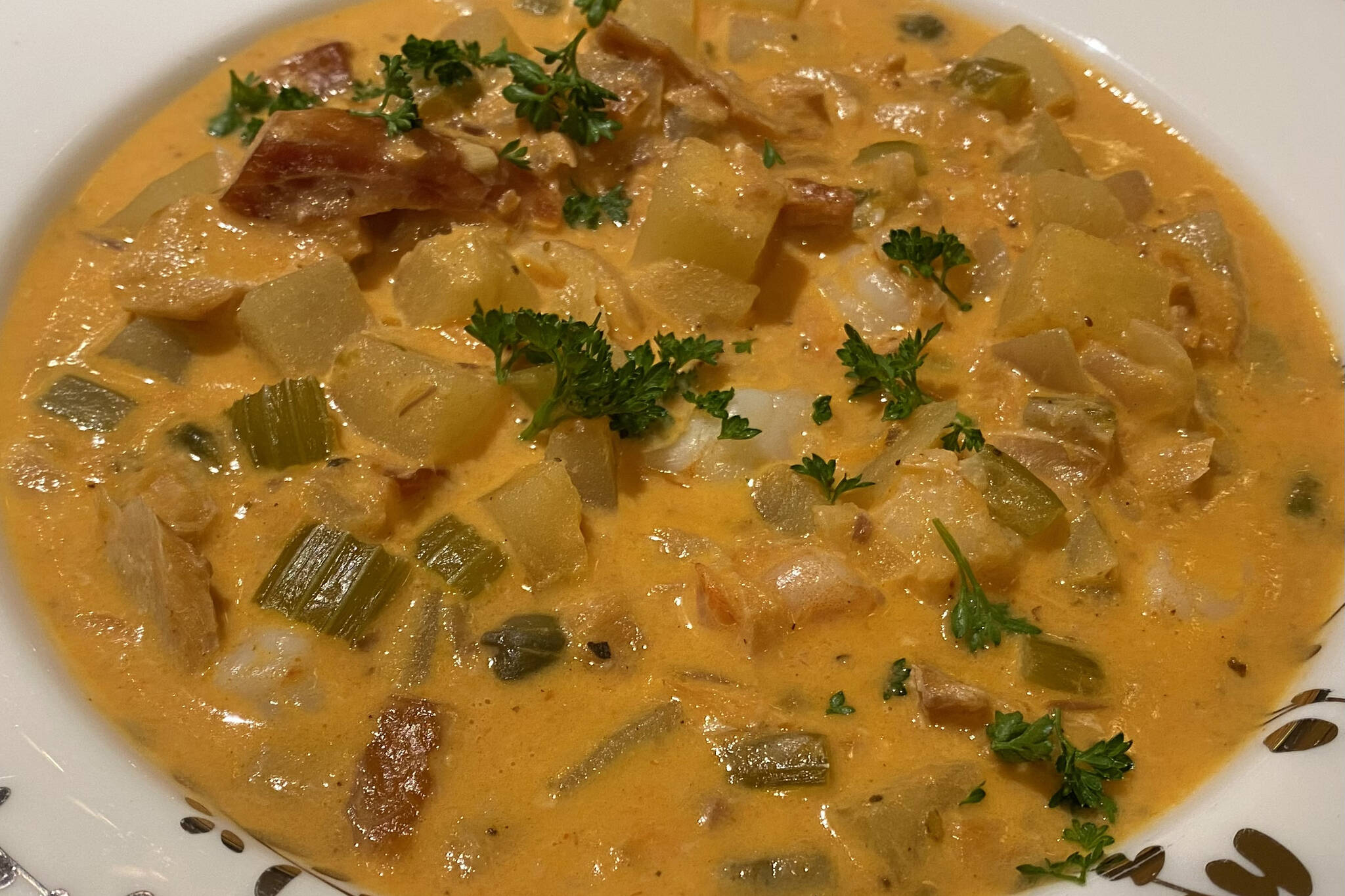 This hearty salmon chowder takes a shot at recreating the famous smoked salmon chowder served at Pike Place Chowder in Seattle. (Photo by Tressa Dale/Peninsula Clarion)