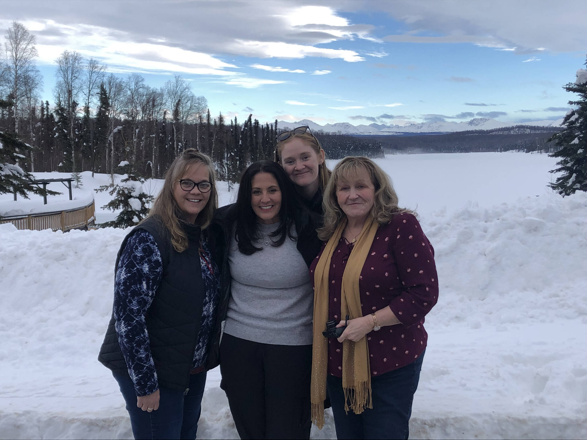 My mom Alex Botello, my aunt Melissa Botello, myself, and my aunt Kim Davis take a photo in Talkeetna on Friday Feb. 25, 2022. (Camille Botello/Peninsula Clarion)