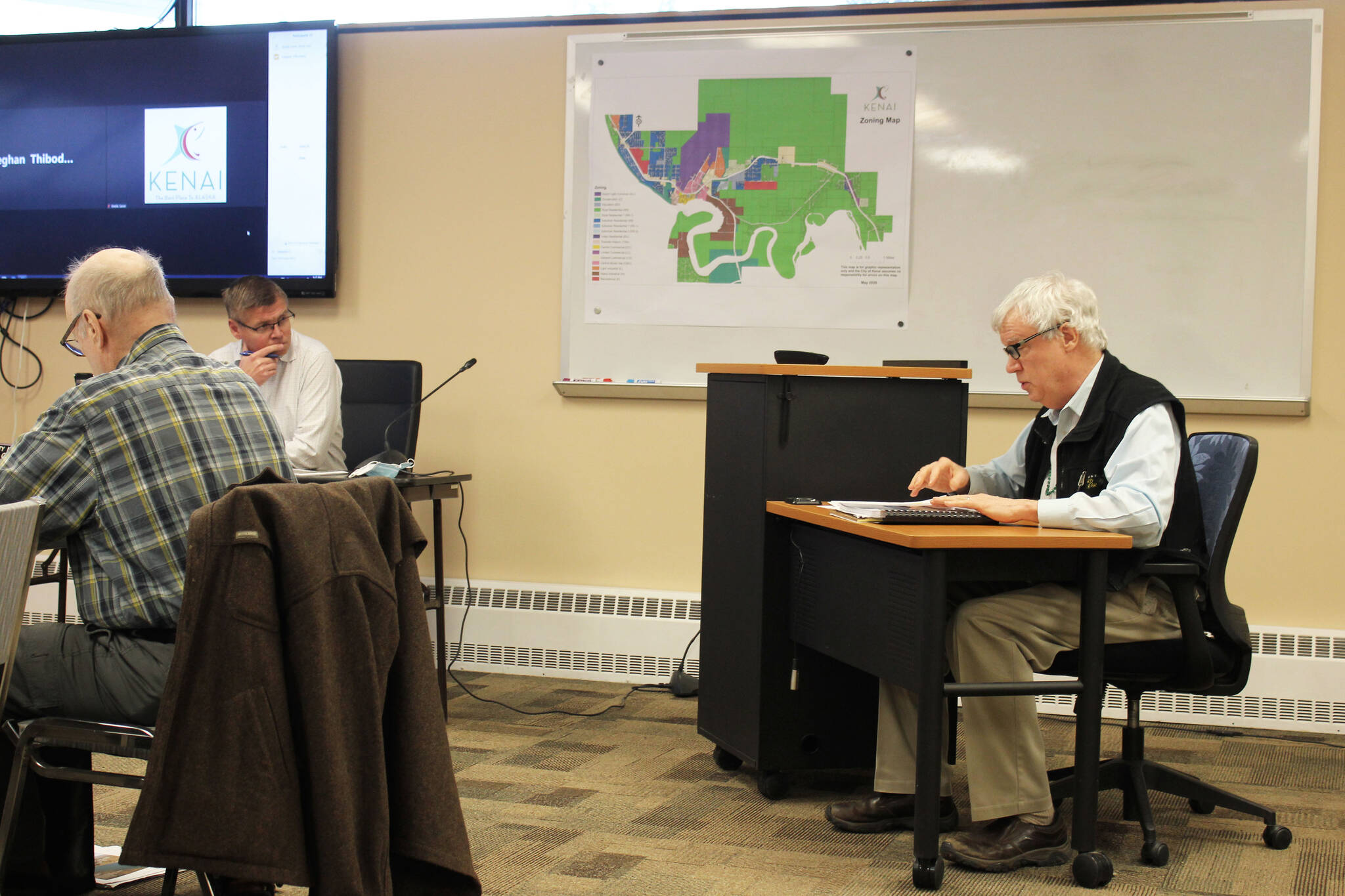 Former Kenai Vice Mayor Bob Molloy (right) proposes changes to the City of Kenai’s draft Land Management Plan during a city council work session on Monday, March 7, 2022 in Kenai, Alaska. (Ashlyn O’Hara/Peninsula Clarion)