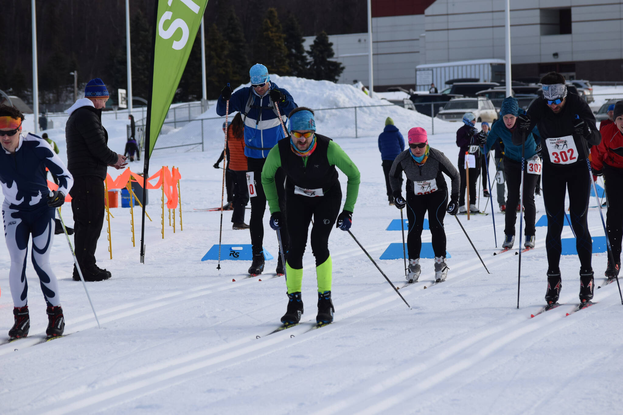 Skiers take off for the men’s 40K freestyle race at Sunday’s Tour of Tsalteshi event just outside of Soldotna on Sunday, Feb. 20, 2022. (Camille Botello/Peninsula Clarion)