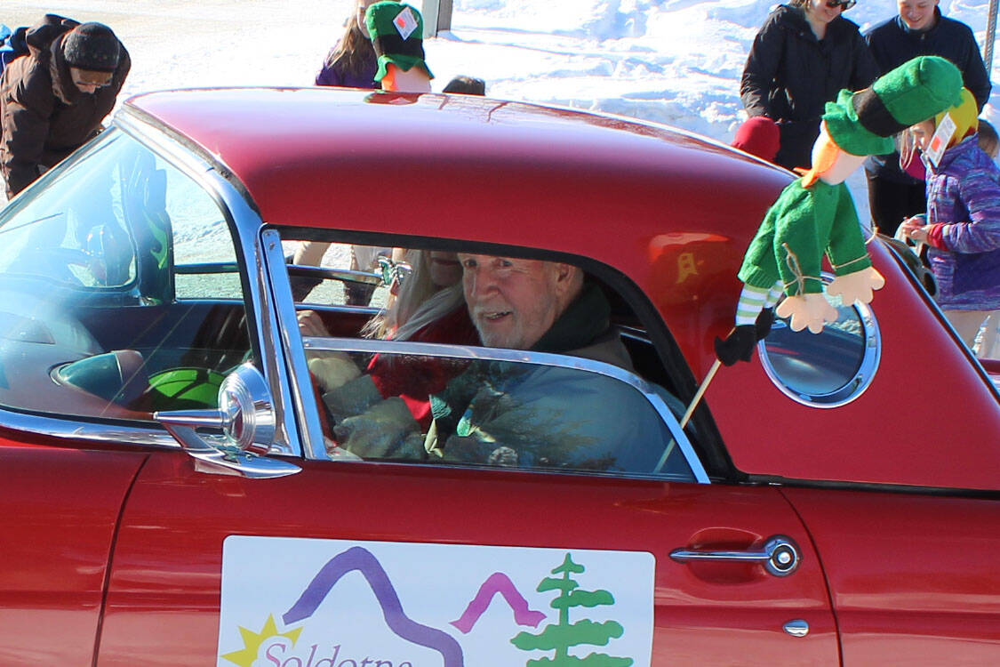 People with Soldotna Senior Citizens drive a Thunderbird during the 30th Annual Sweeney’s St. Patrick’s Day parade on Wednesday, March 17, 2021, in Soldotna, Alaska. (Ashlyn O’Hara/Peninsula Clarion)