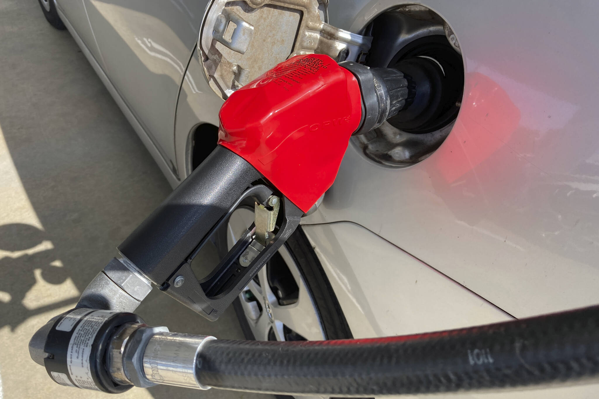 AP Photo / Wilfredo Lee
A car is shown at a gas pump Jan. 21 at a station in North Miami, Fla. Gov. Mike Dunleavy and Alaska state lawmakers are moving to temporarily suspend the state’s motor fuel tax as oil prices rise.