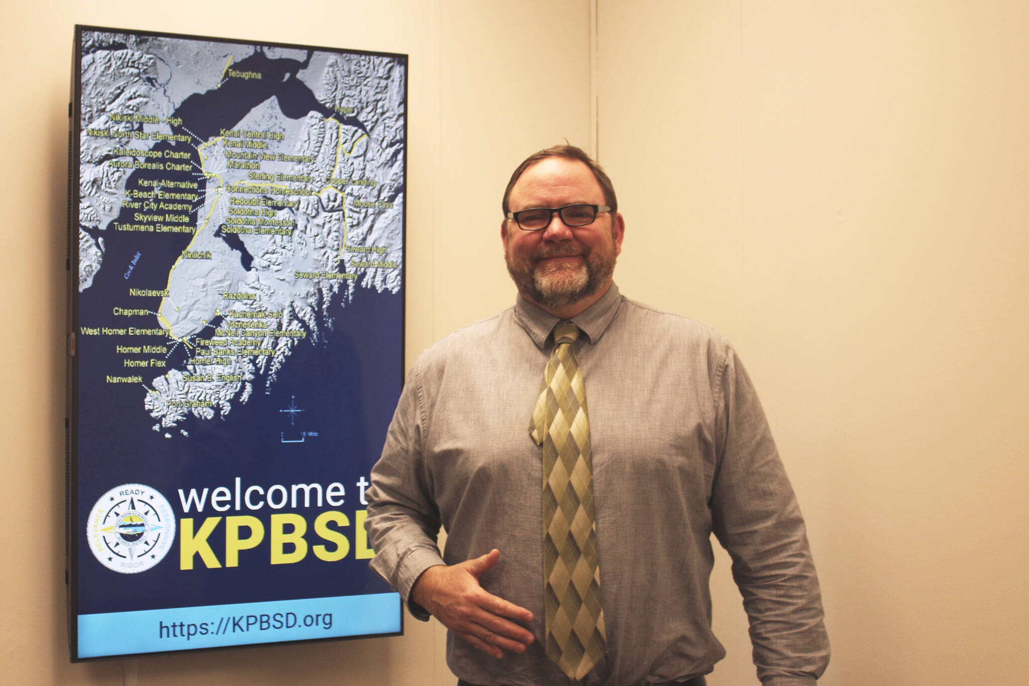 Kenai Peninsula Borough School District Superintendent Clayton Holland stand near the entrance to the district’s Soldotna offices on Thursday, March 17, 2022 in Soldotna, Alaska. (Ashlyn O’Hara/Peninsula Clarion)