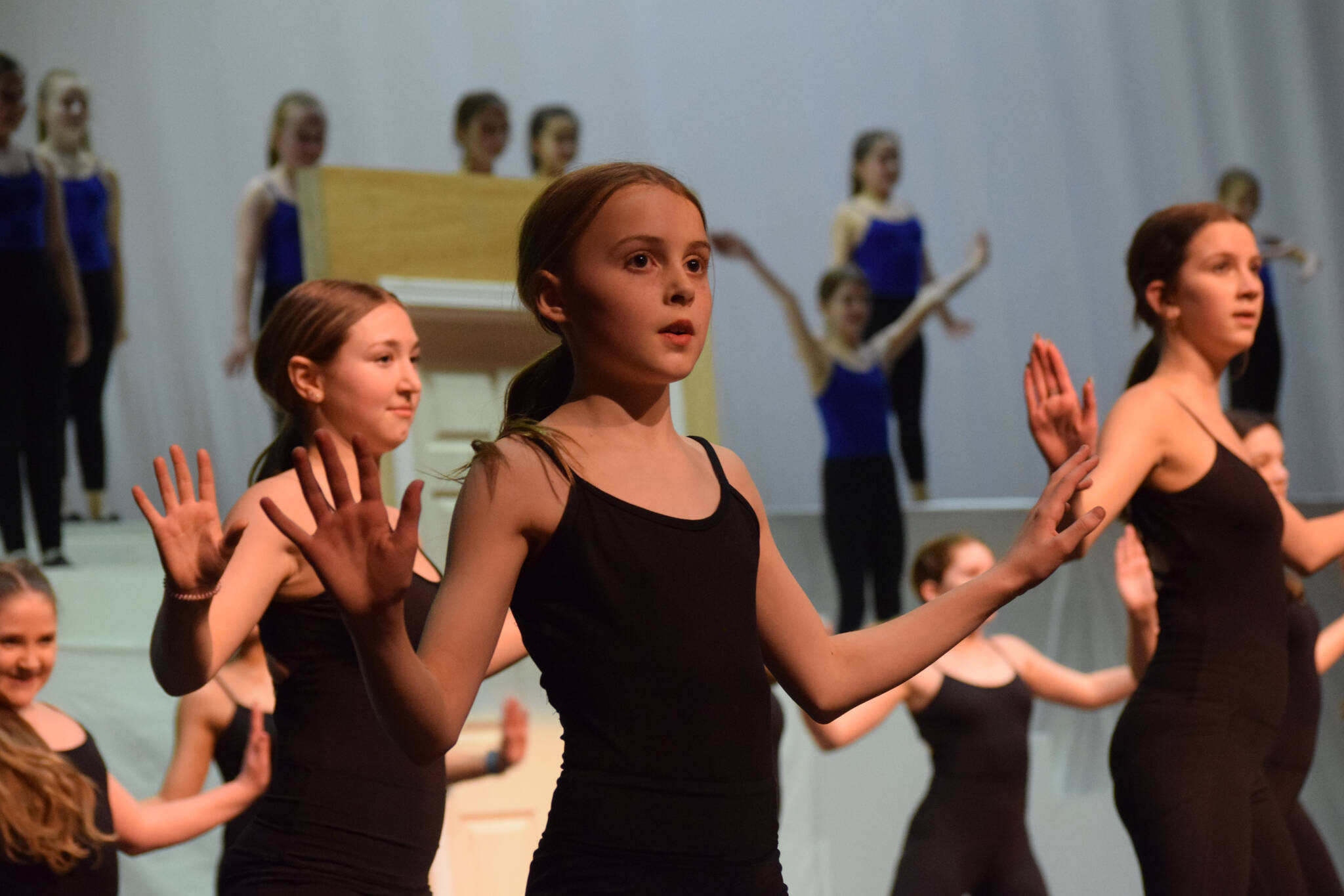 Performers prepare for the Forever Dance company showcase “Among Dreams” during a rehearsal on Tuesday, March 22, 2022, at the Renee C. Henderson Auditorium in Kenai, Alaska. (Camille Botello/Peninsula Clarion)
