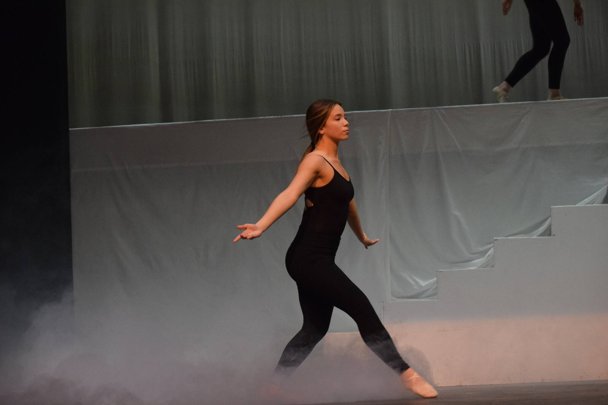 Isabella Valenzuela prepares for the Forever Dance company showcase “Among Dreams” during a rehearsal on Tuesday, March 22, 2022 at the Renee C. Henderson Auditorium in Kenai, Alaska. (Camille Botello/Peninsula Clarion)