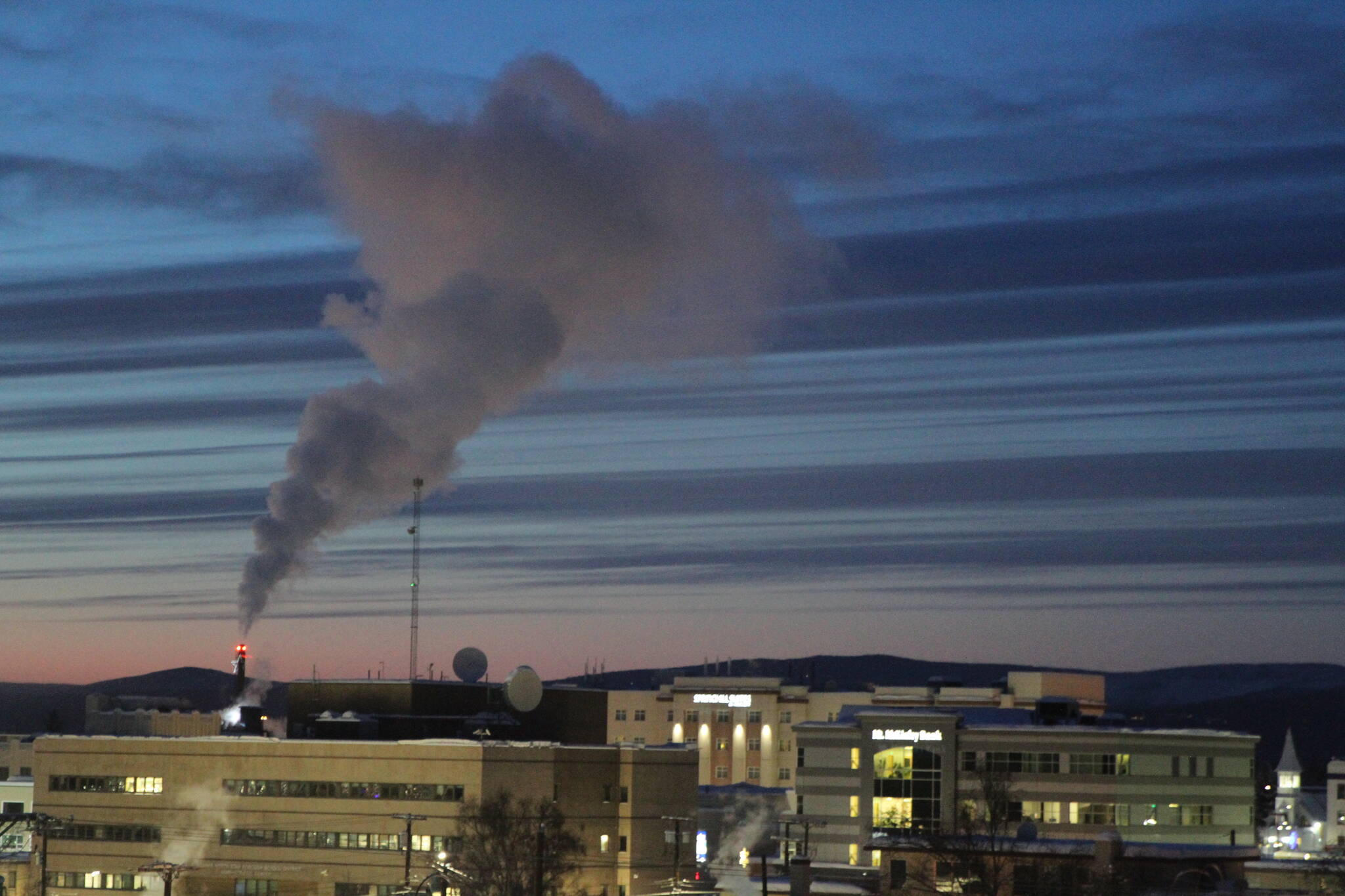 This Feb. 16, 2022, photo shows a plume of smoke being emitted into the air from a power plant in Fairbanks, Alaska, which has some of the worst polluted winter air in the United States. Over seven weeks this winter, nearly 50 scientists from the continental U.S. and Europe descended on Fairbanks to study the sources of air pollution. (AP Photo/Mark Thiessen)