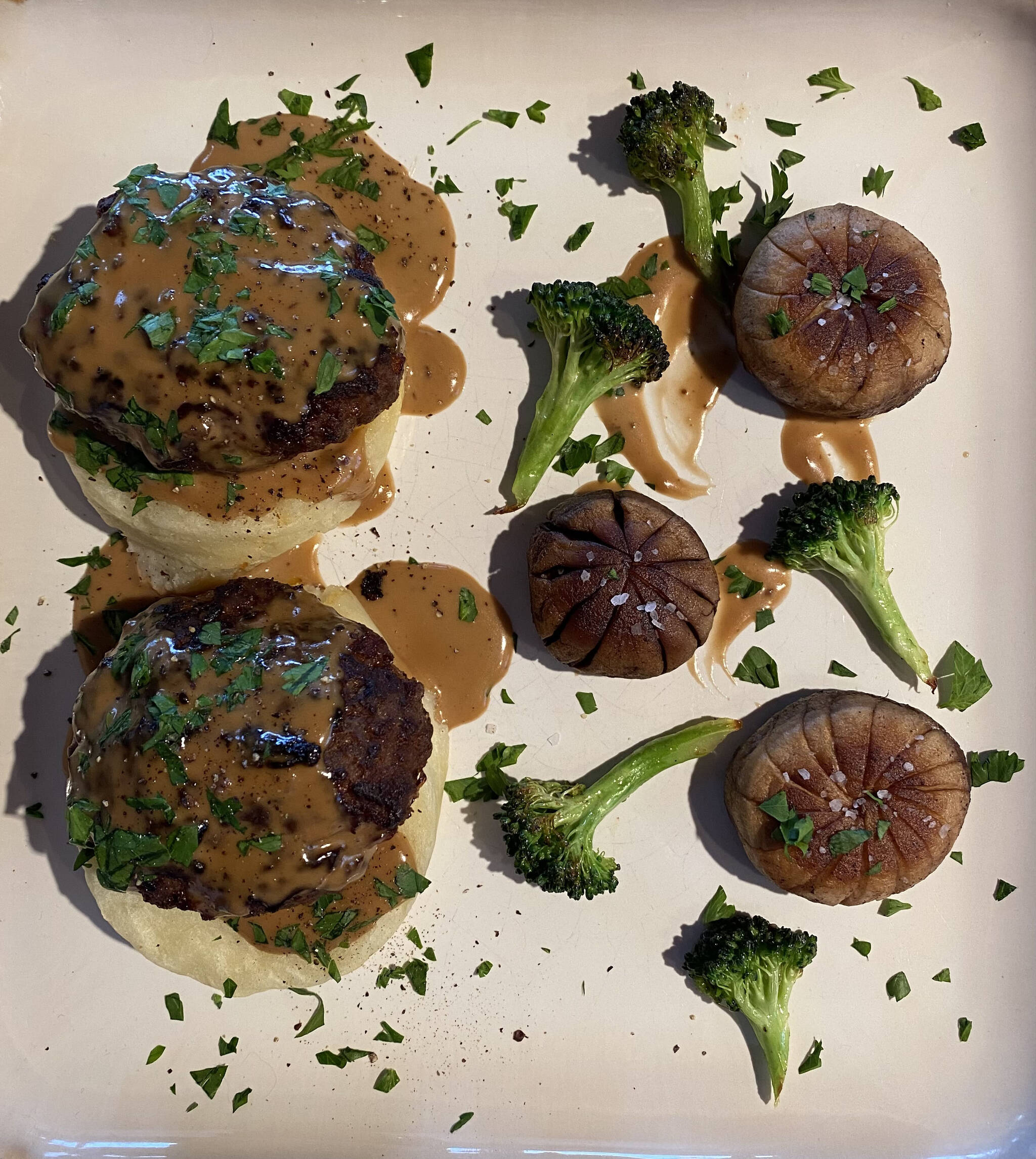 Salisbury steak, a classic of American cuisine, is served with mushrooms and broccoli. (Photo by Tressa Dale/Peninsula Clarion)