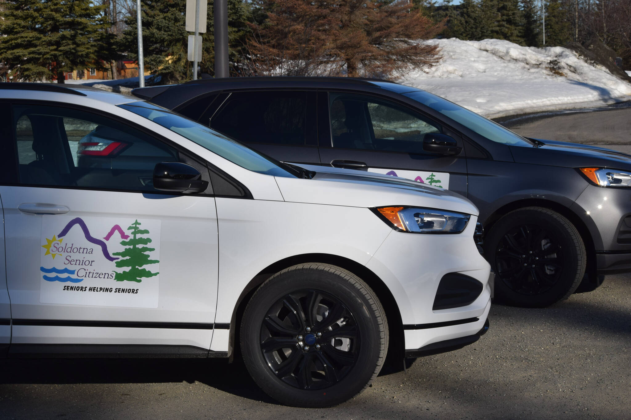 Two new cars purchased by the Soldotna Senior Center to support its Meals on Wheels program are parked outside the center in Soldotna, Alaska, on Wednesday, March 30, 2022. The senior center used $100,000 provided through the federal American Rescue Plan Act to purchase the vehicles. (Camille Botello/Peninsula Clarion)