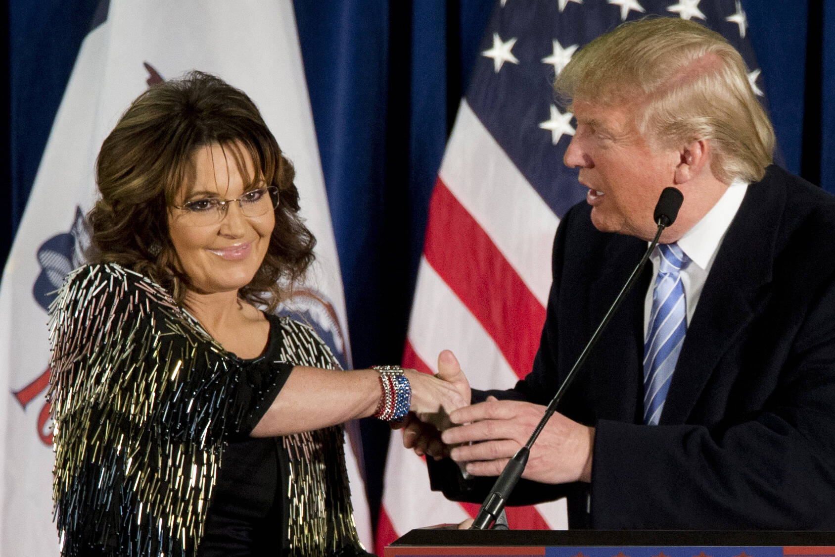 Former Alaska Gov. Sarah Palin, left, appears with then-Republican presidential candidate Donald Trump at a rally at the Iowa State University on Jan. 19, 2016, in Ames, Iowa. Former Alaska Gov. Sarah Palin has picked up a prized endorsement in her bid in an extremely crowded field to fill the unexpired term of the late U.S. Rep. Don Young. Former President Donald Trump backed Palin on Sunday, April 3, 2022, in a statement from his political action committee. (AP Photo/Mary Altaffer, File)