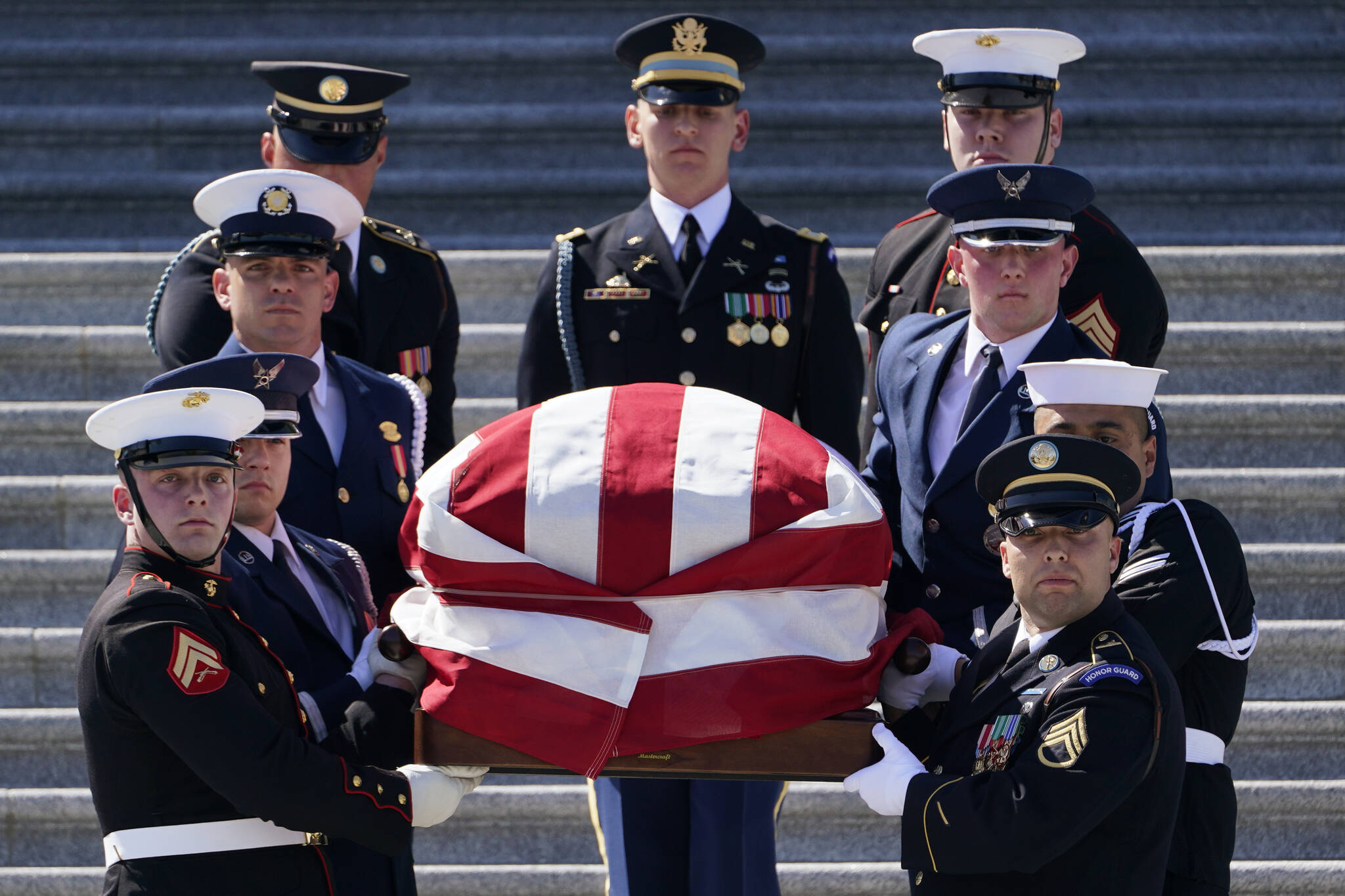 A joint forces honor guard carries the casket of Rep. Don Young, R-Alaska, down the steps of the House of Representatives on Capitol Hill in Washington, Tuesday, March 29, 2022. Young, the longest-serving member of Alaskas congressional delegation, died Friday, March 18, 2022. He was 88. (AP Photo/Susan Walsh)
A joint forces honor guard carries the casket of Rep. Don Young, R-Alaska, down the steps of the House of Representatives on Capitol Hill in Washington, Tuesday, March 29, 2022. Young, the longest-serving member of Alaskas congressional delegation, died Friday, March 18, 2022. He was 88. (AP Photo/Susan Walsh)