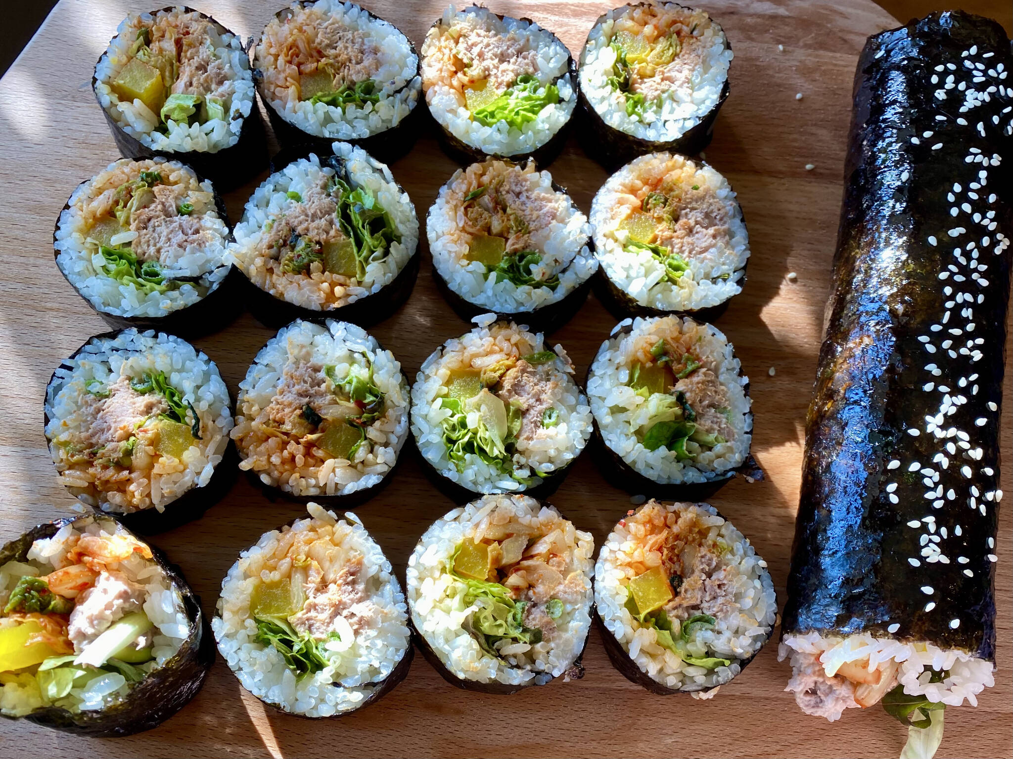Korean kimbap with tuna, kimchi, lettuce and carrots makes a perfect to-go meal. (Photo by Tressa Dale/Peninsula Clarion)