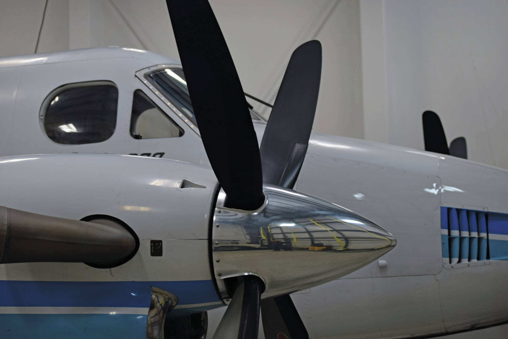 A nine-seat Beechcrafter Super King Air B200 plane sits in a hanger at Kenai Aviation in Kenai, Alaska, on Wednesday, March 9, 2022. (Camille Botello/Peninsula Clarion)